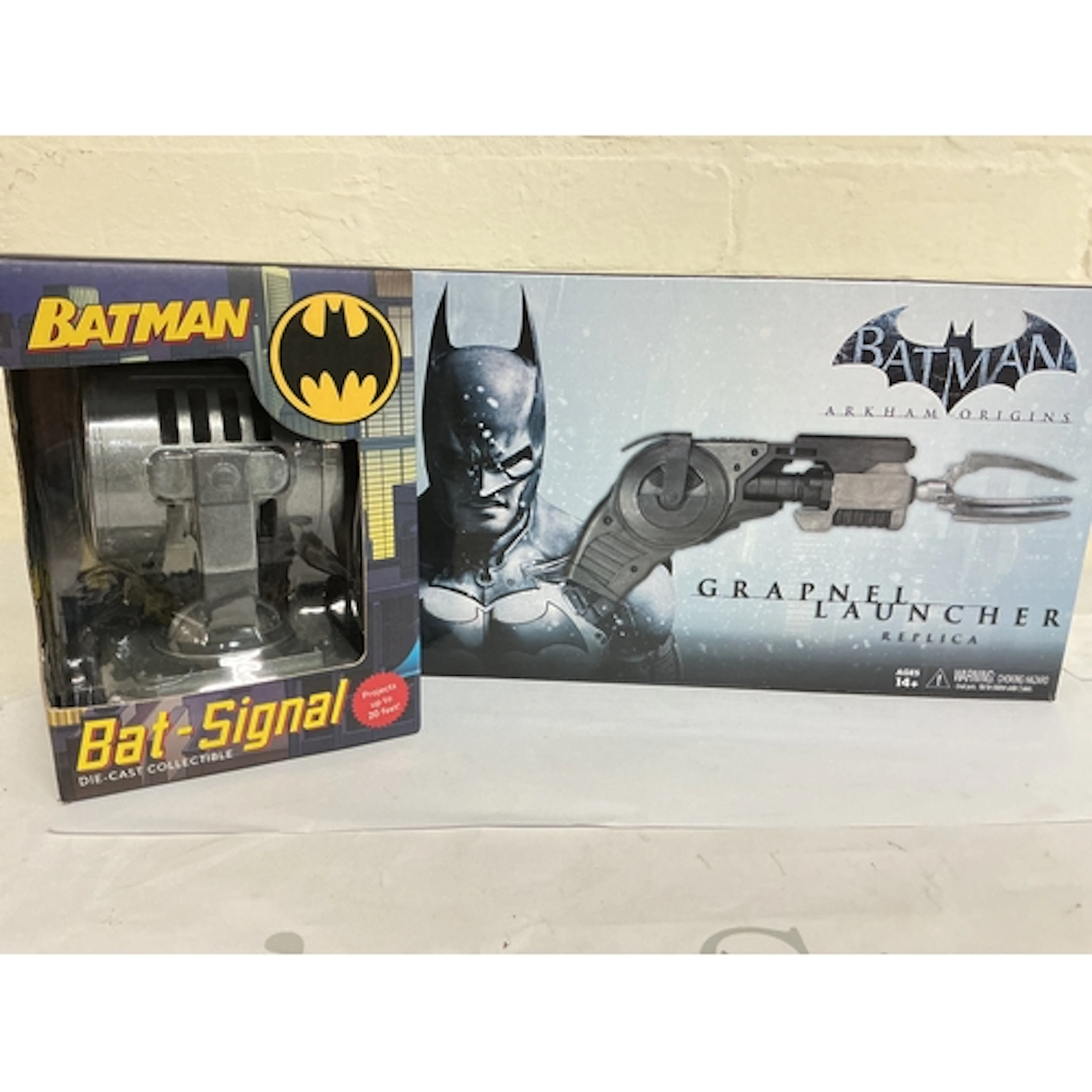 A Boxed DC Comics Diecast Bat Signal And A Arkham Originals ...