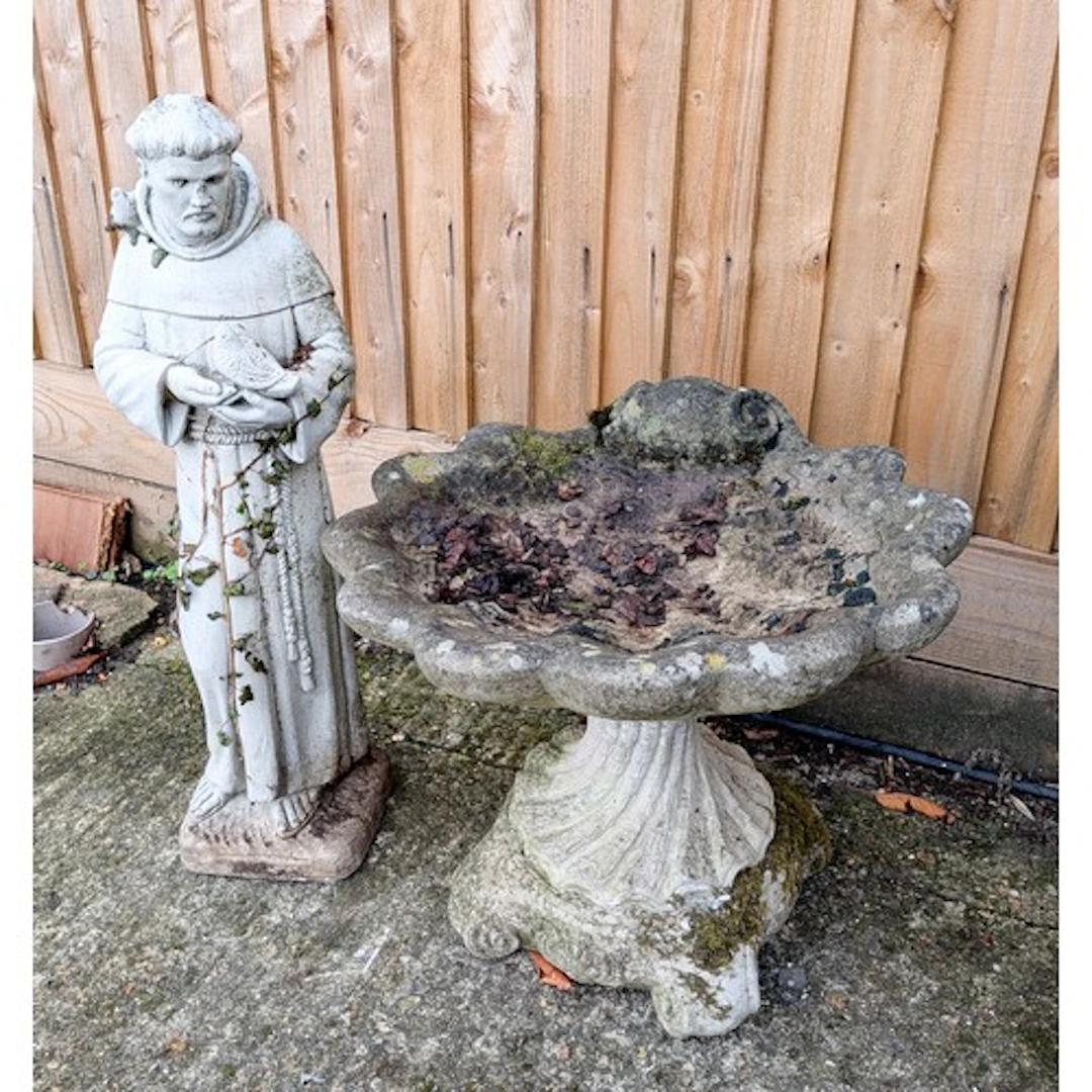 A reconstituted stone shell shaped bord bath together with a...
