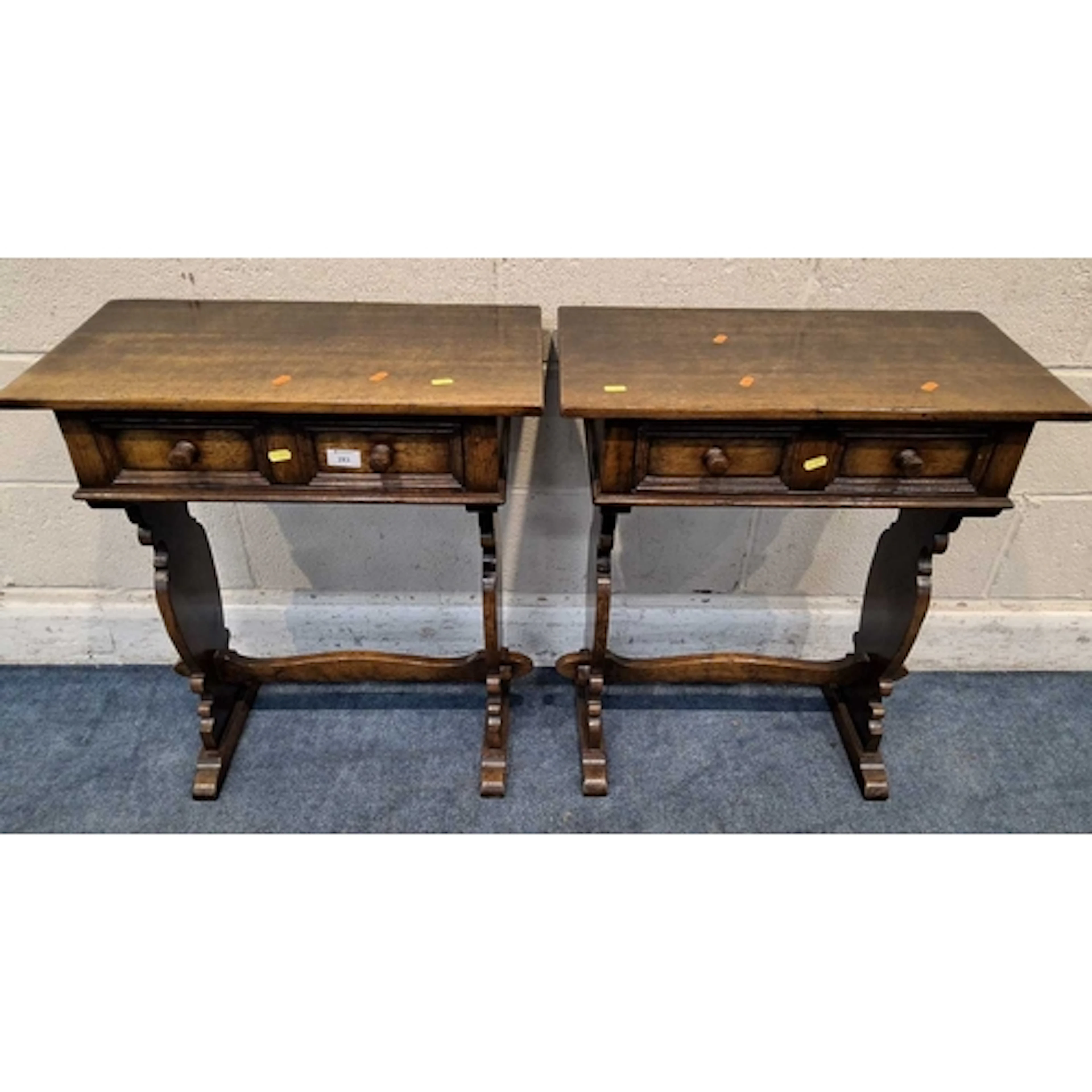 TITCHMARSH AND GOODWIN, A PAIR OF OAK SIDE TABLES, each fitt...
