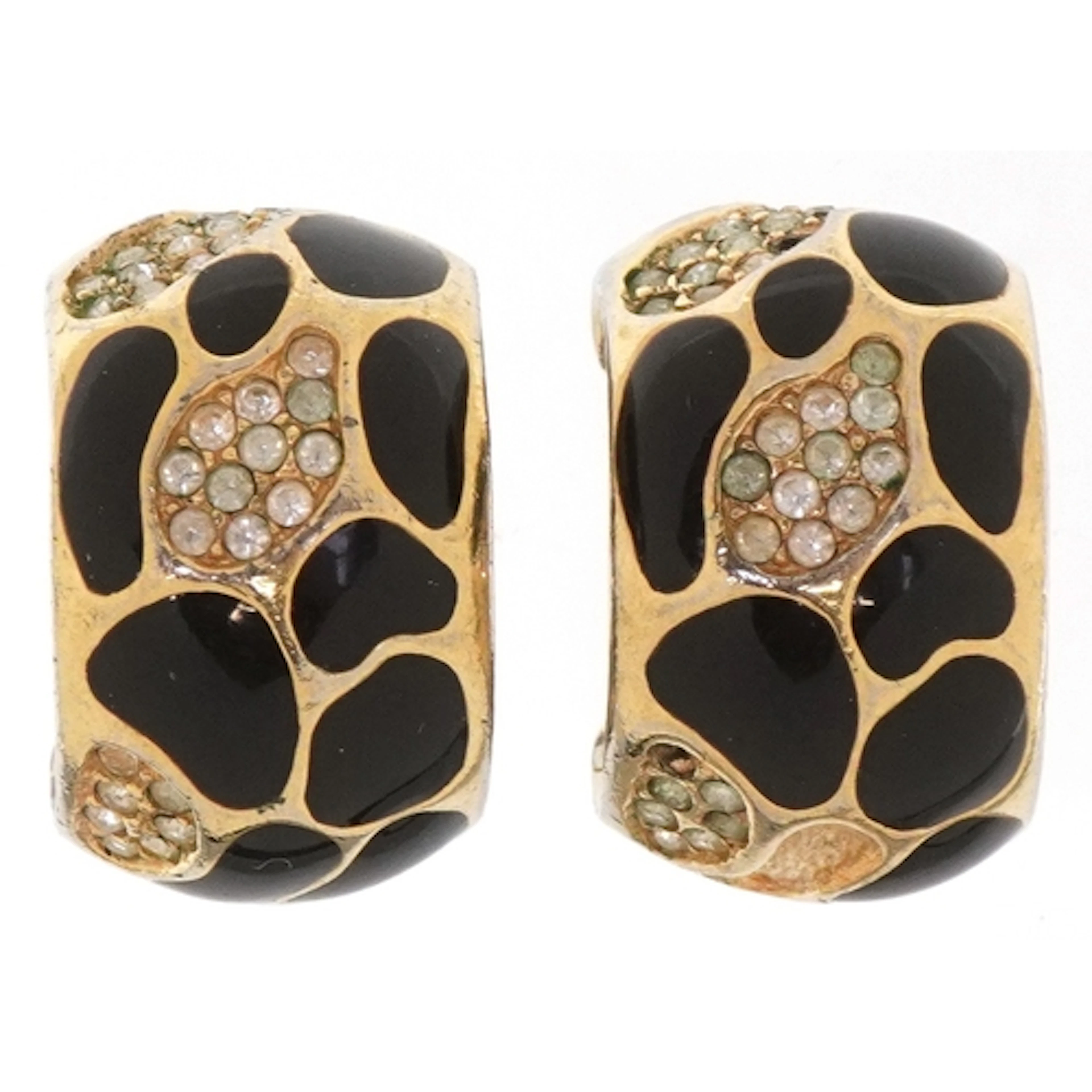 Christian Dior, a pair of vintage gold plated and black enam...