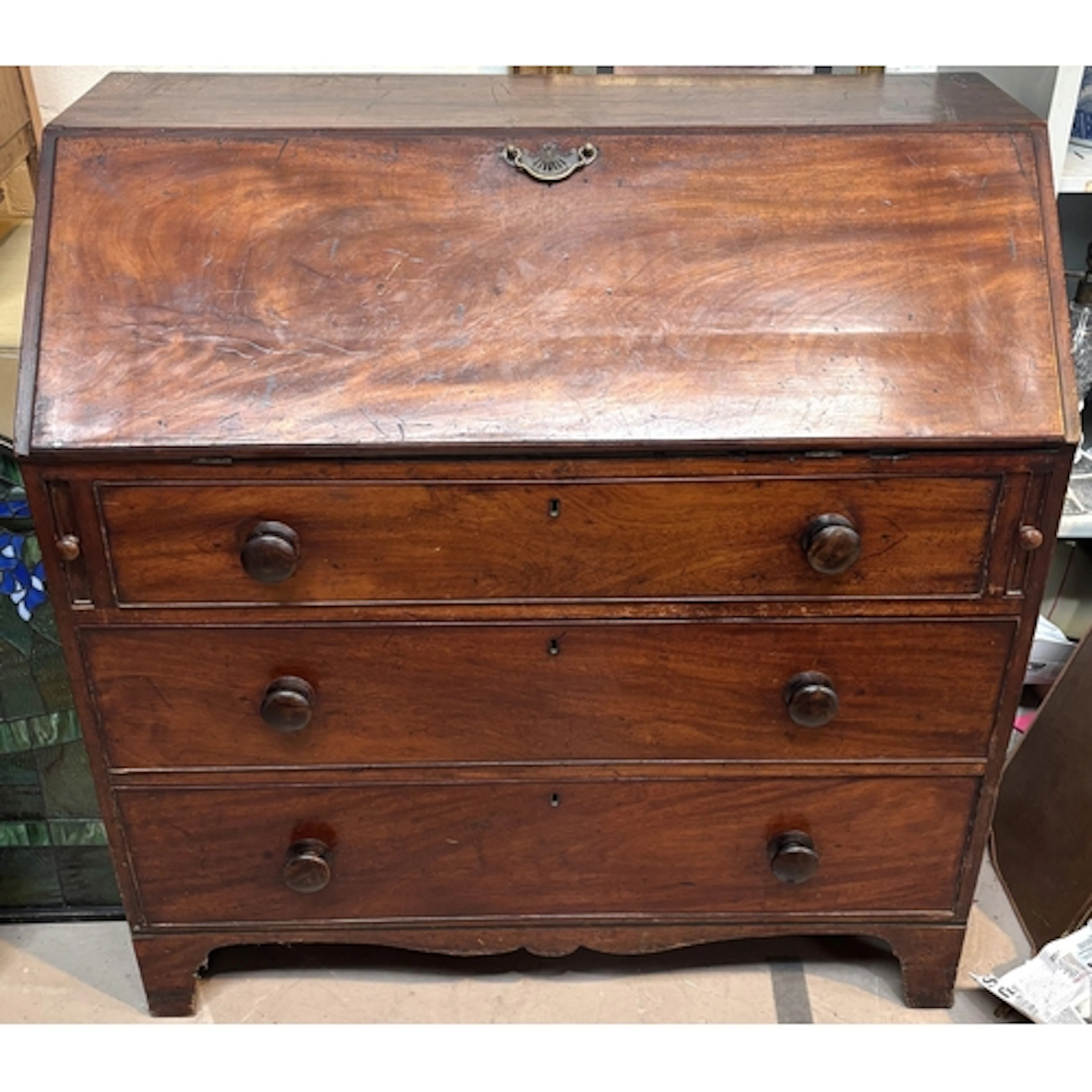 George III fitted mahogany bureau with 3 long drawers and se...