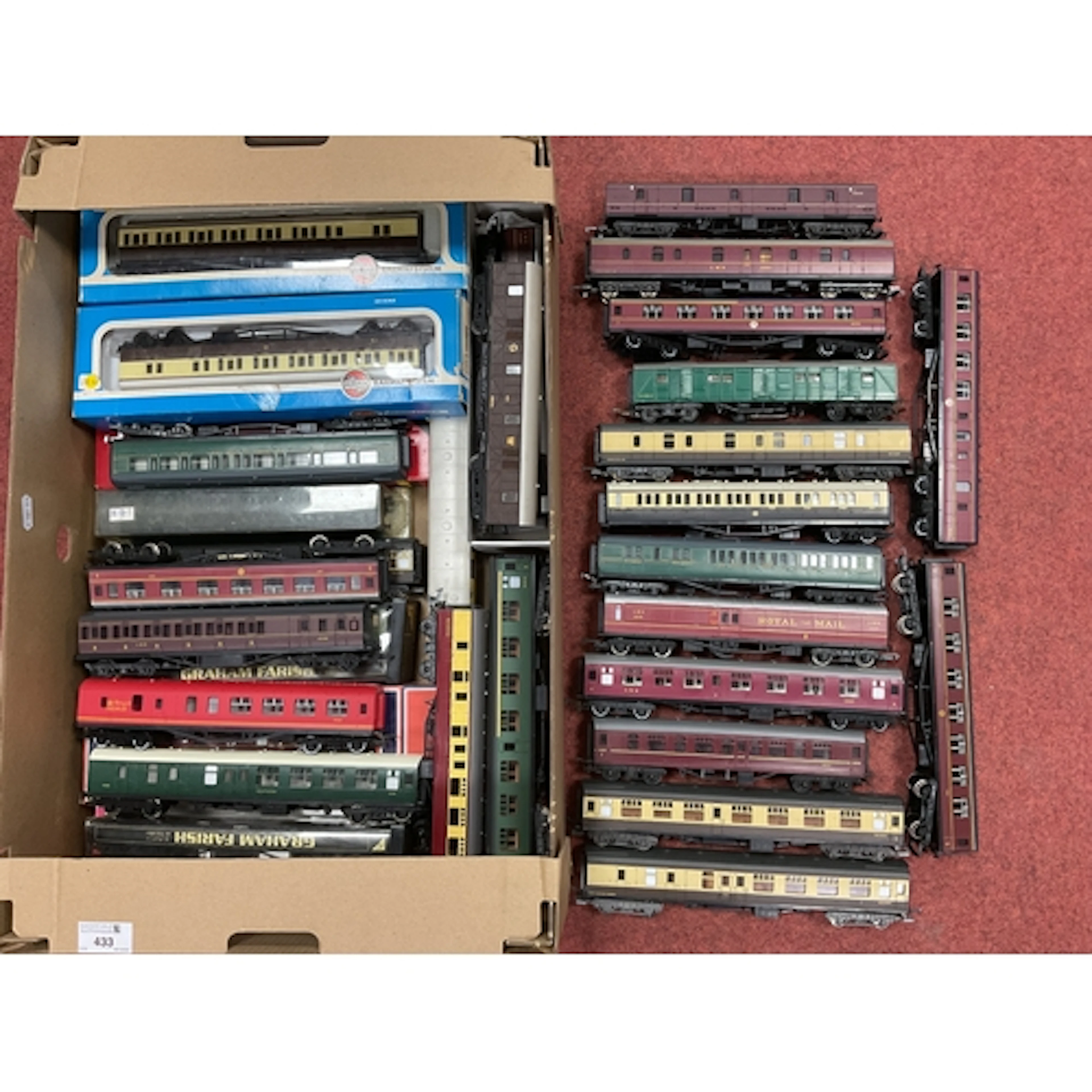 Approximately thirty 00 gauge coaches and parcels vans by Ho...