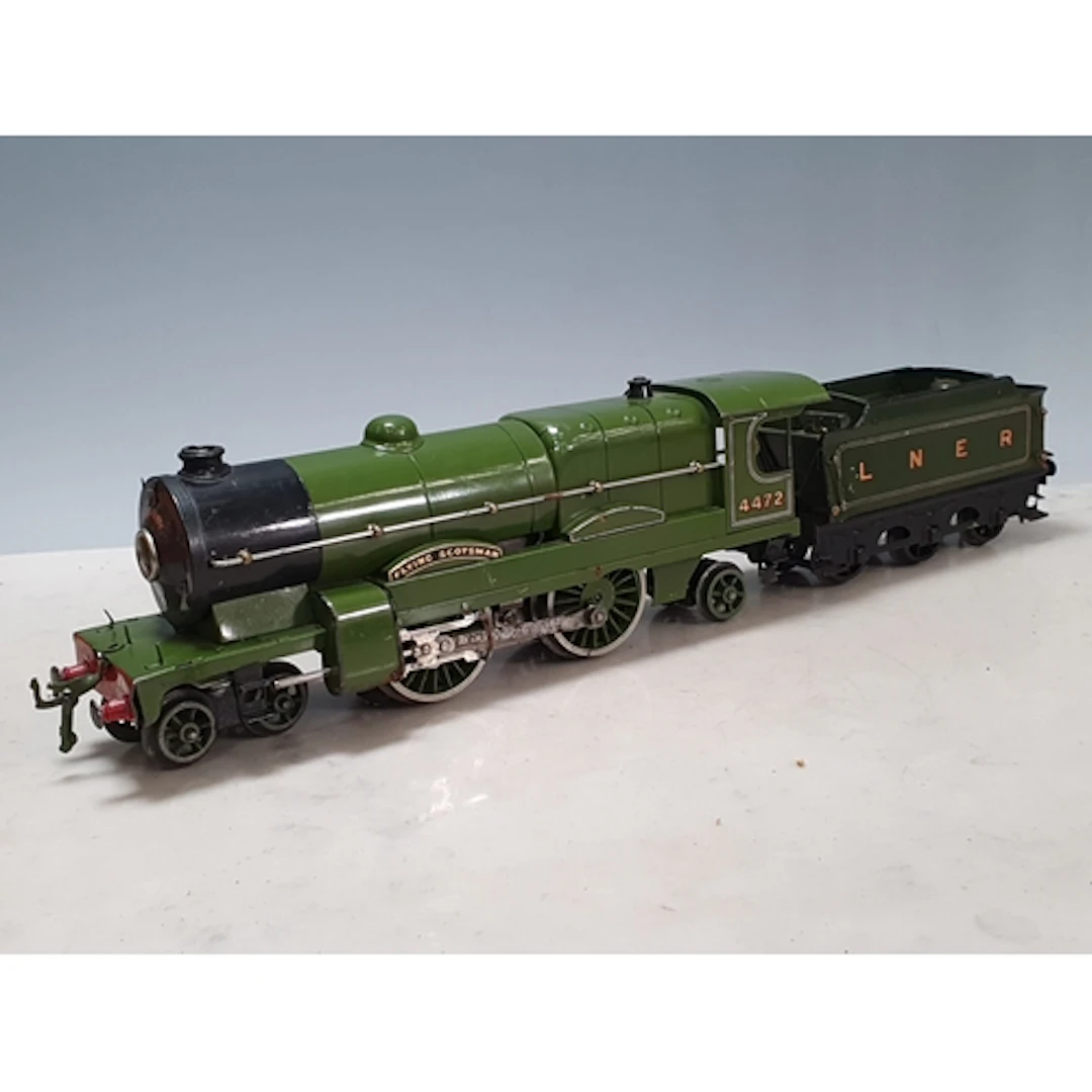 An unboxed Hornby 0 gauge E4E 20V electric 4-4-2 Locomotive ...