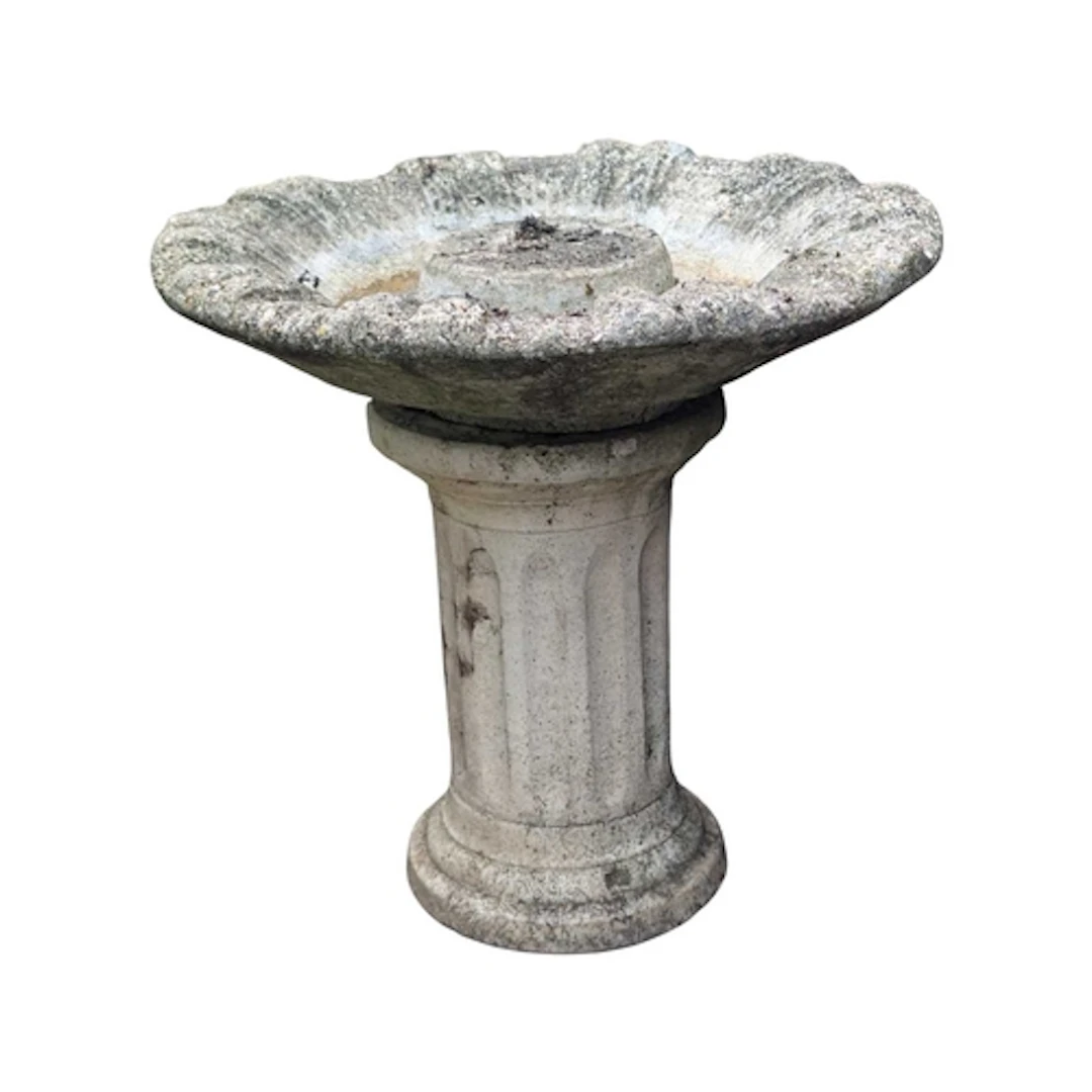 A collection of as found garden outdoor stone pillars, colum...