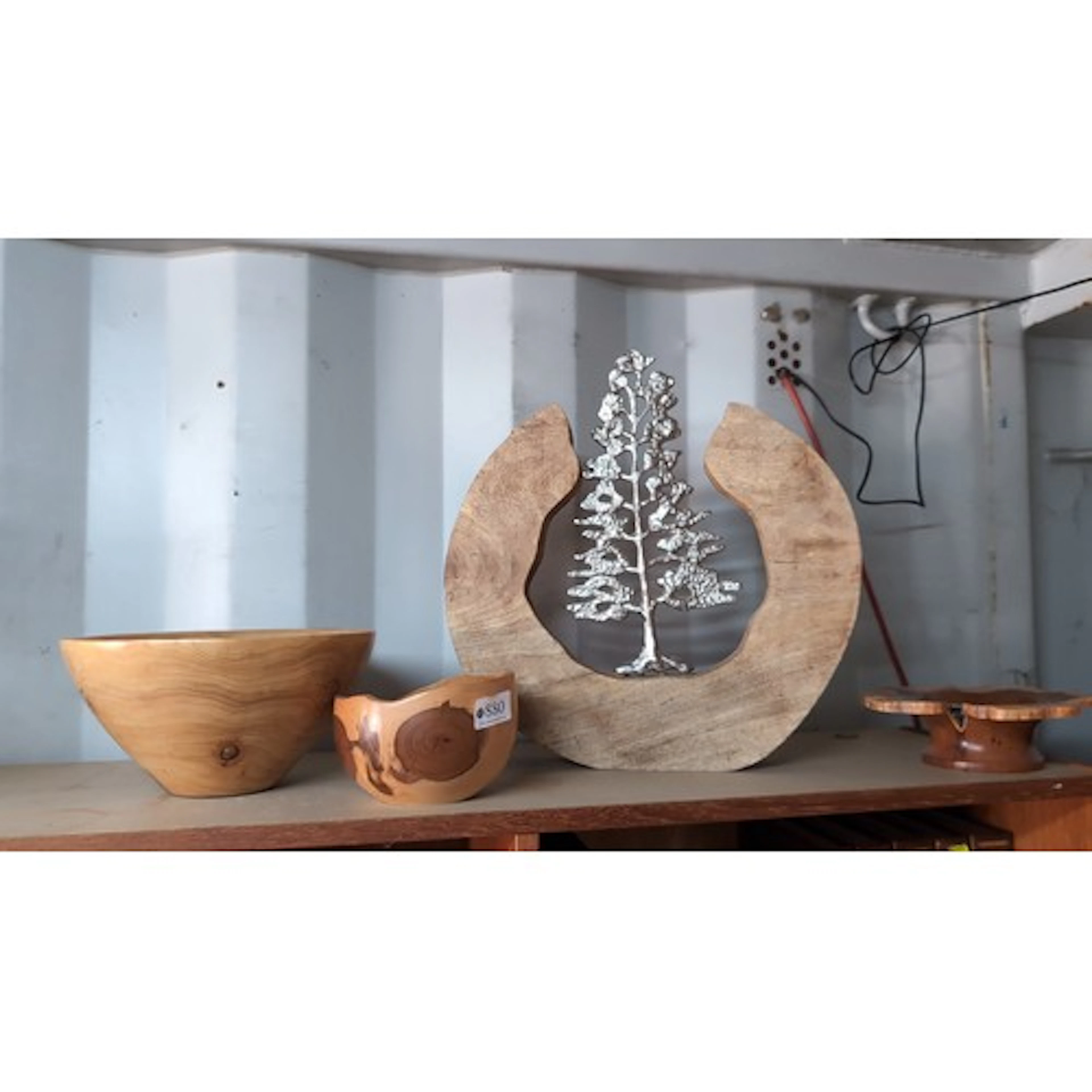 An assortment of modern turned yew-wood bowls, one inscribed...