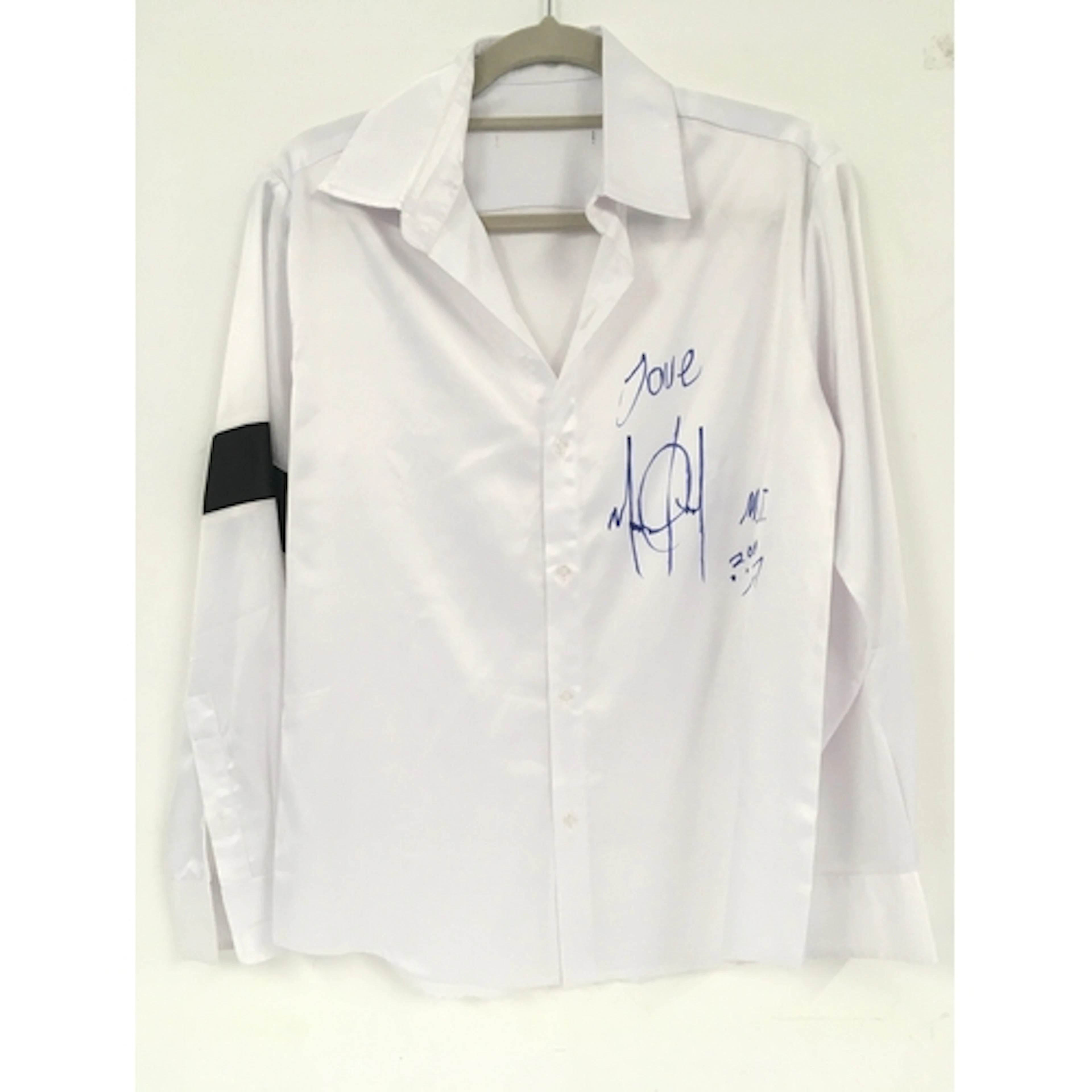 Michael Jackson. A silk shirt signed in blue marker pen by M...