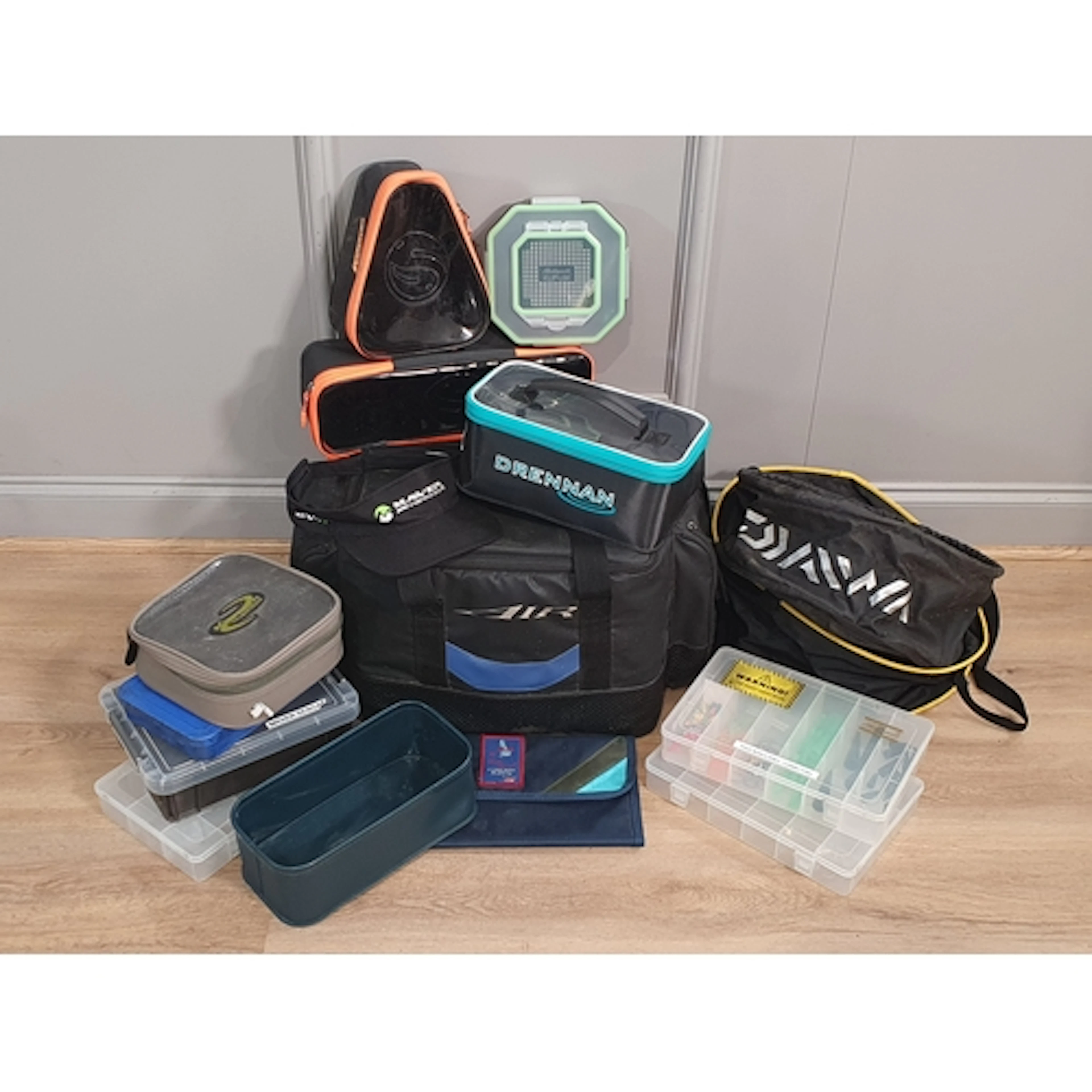 A Daiwa "Air" black Luggage Bag containing Groundbait Bowls,...