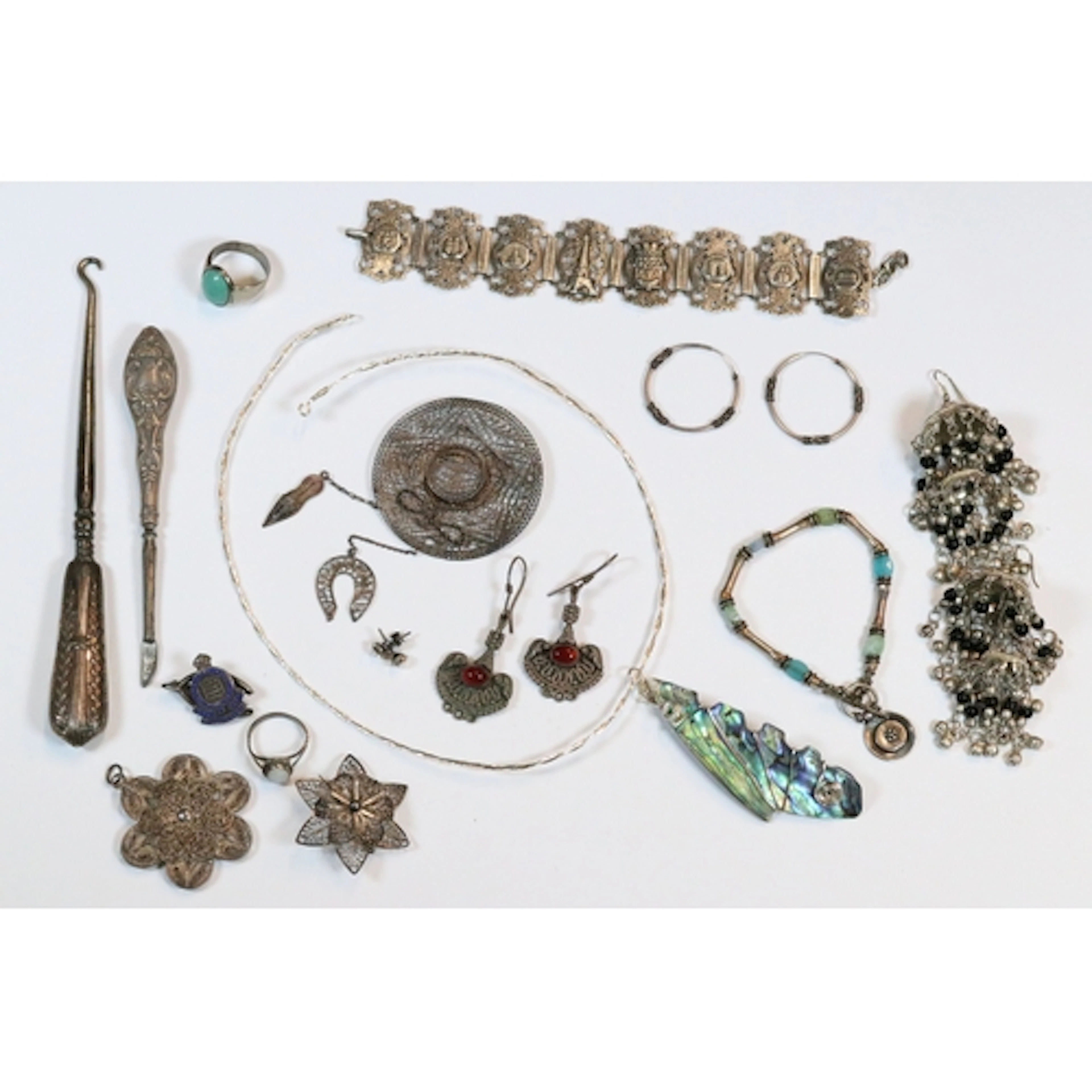 Collection of silver and white metal jewellery and collectab...