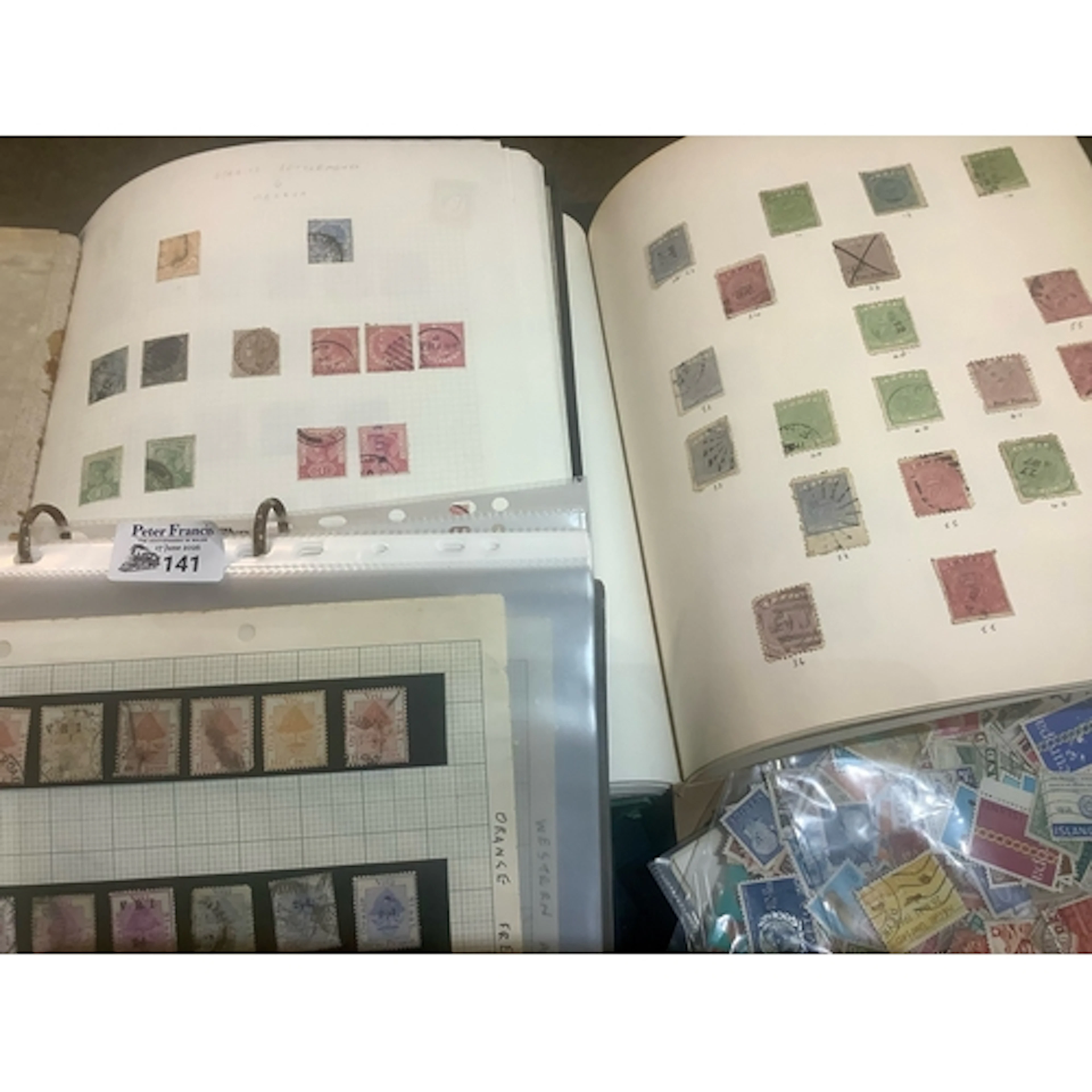 Collection of Scandinavian stamps on pages and in packets - ...