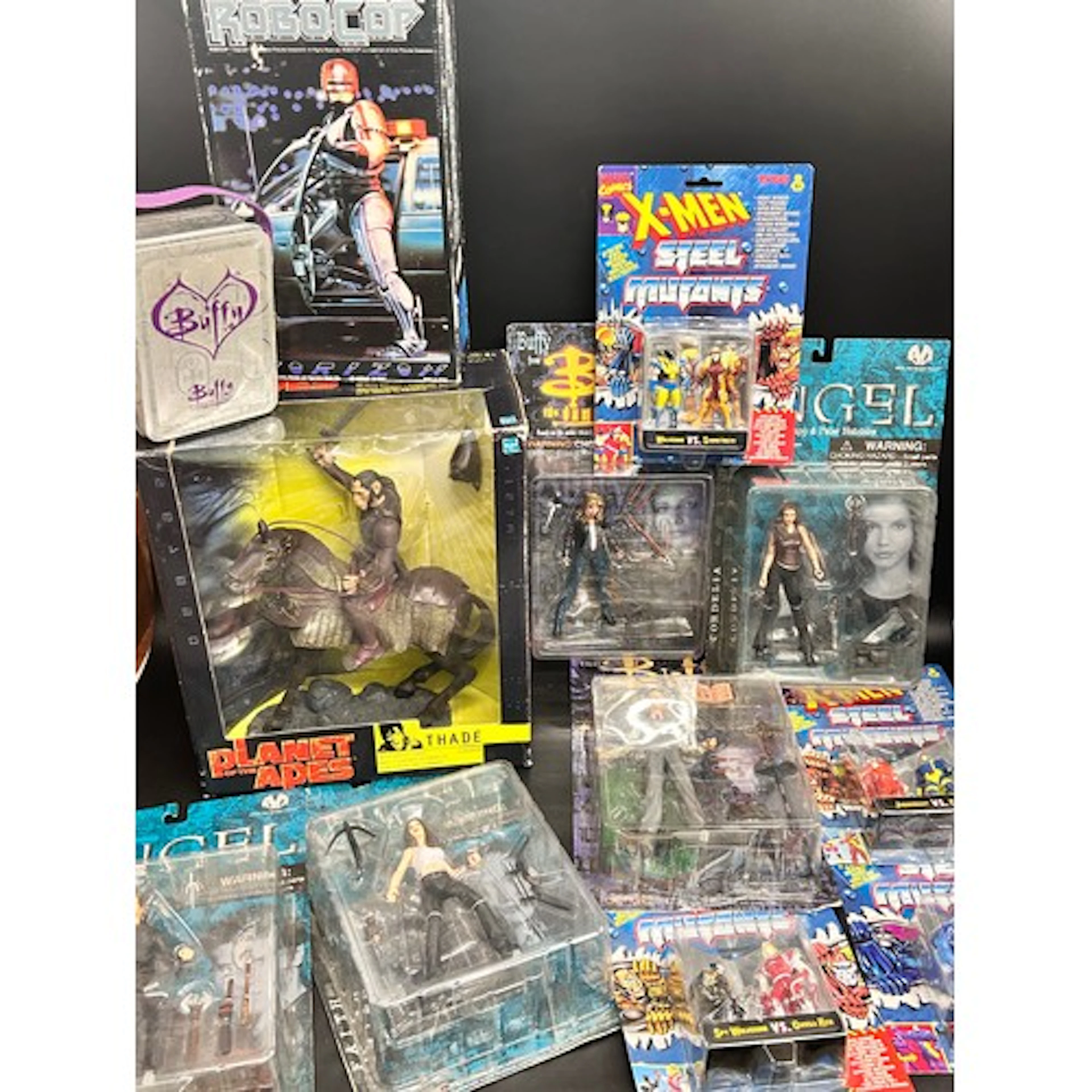 A collection of 1990s toys including X-Men, Buffy The Vampir...
