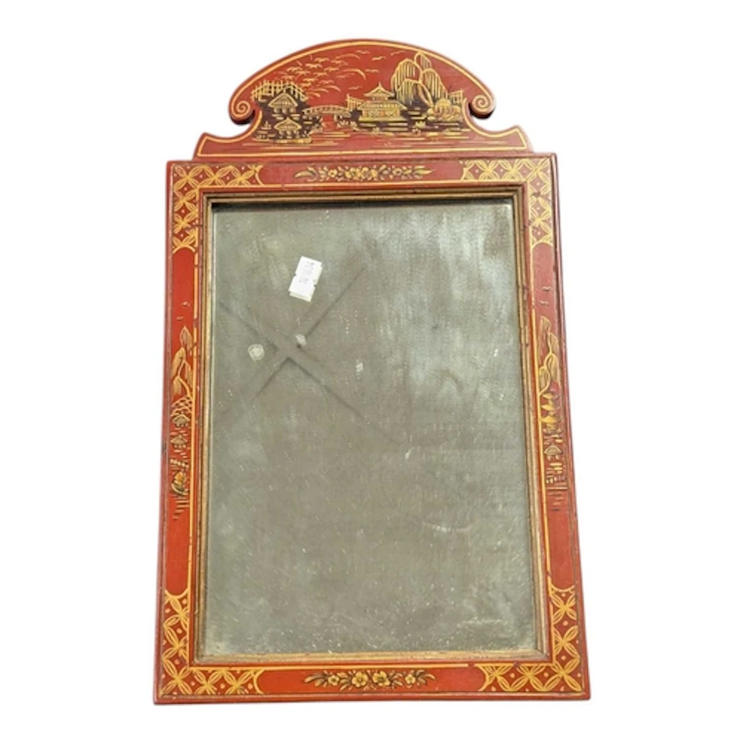 An early 20th century Japanese wooden framed mirror. The mir...