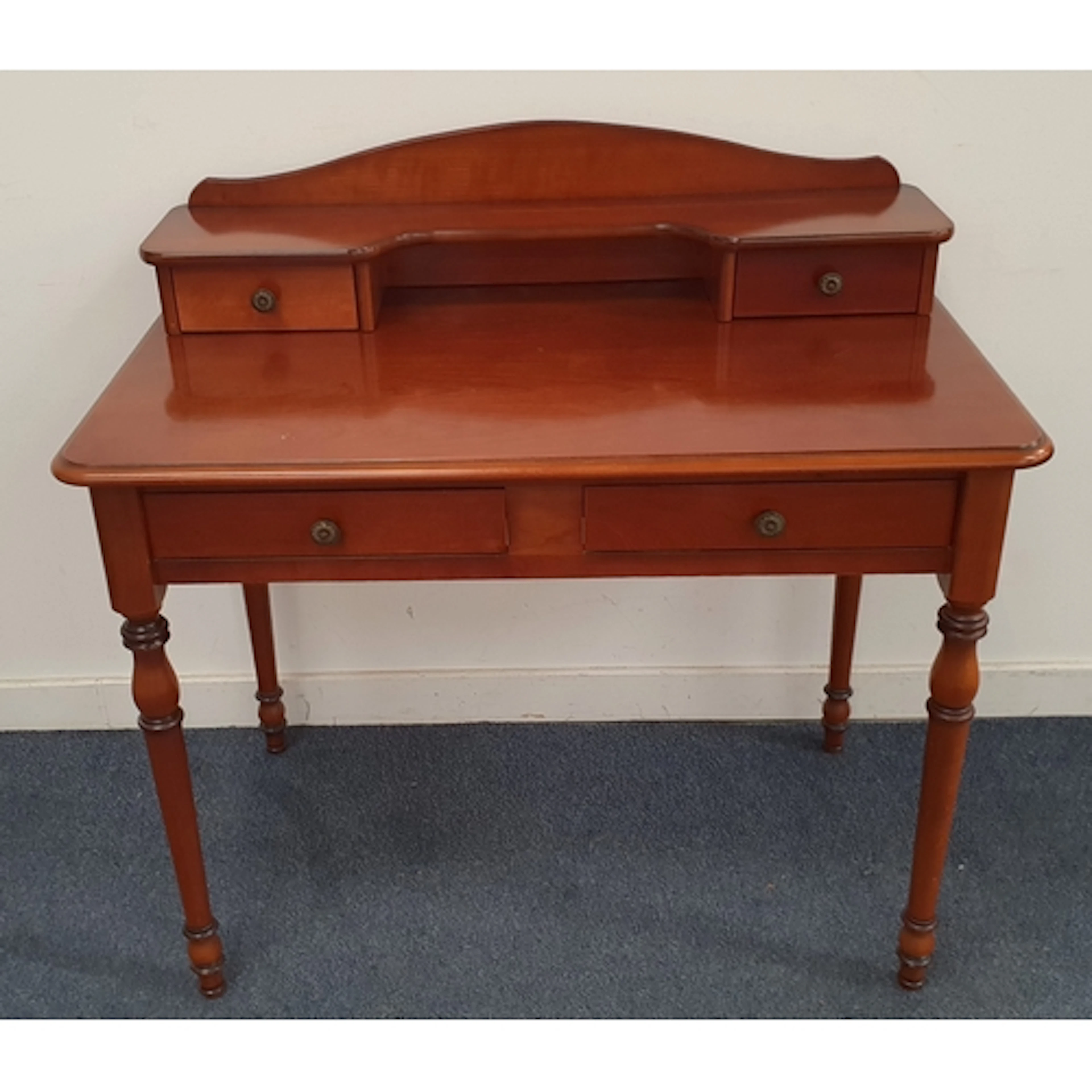 MODERN DESK/DRESSING TABLE with warm mahogany veneer, featur...