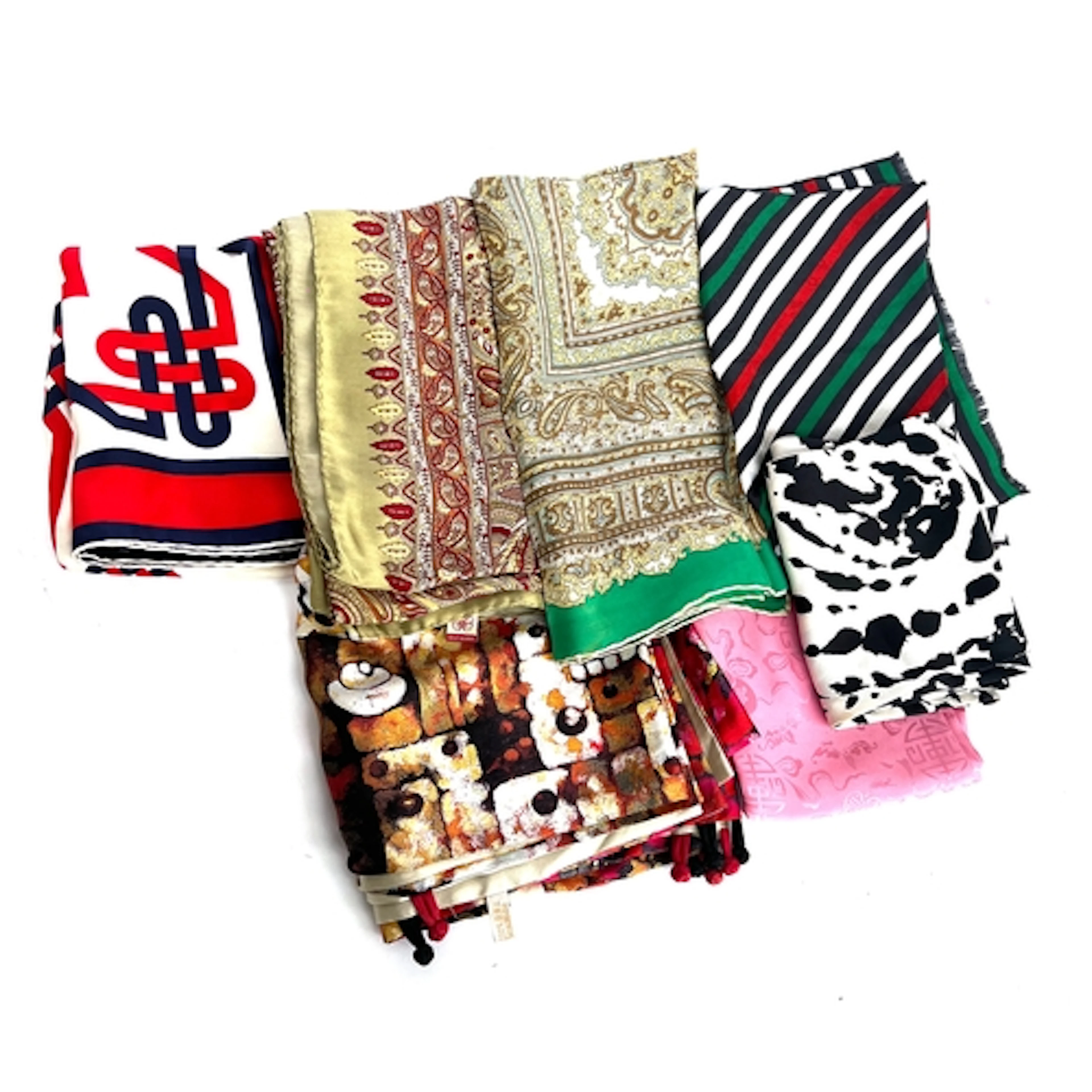 A group of seven silk and other vintage scarves to include p...