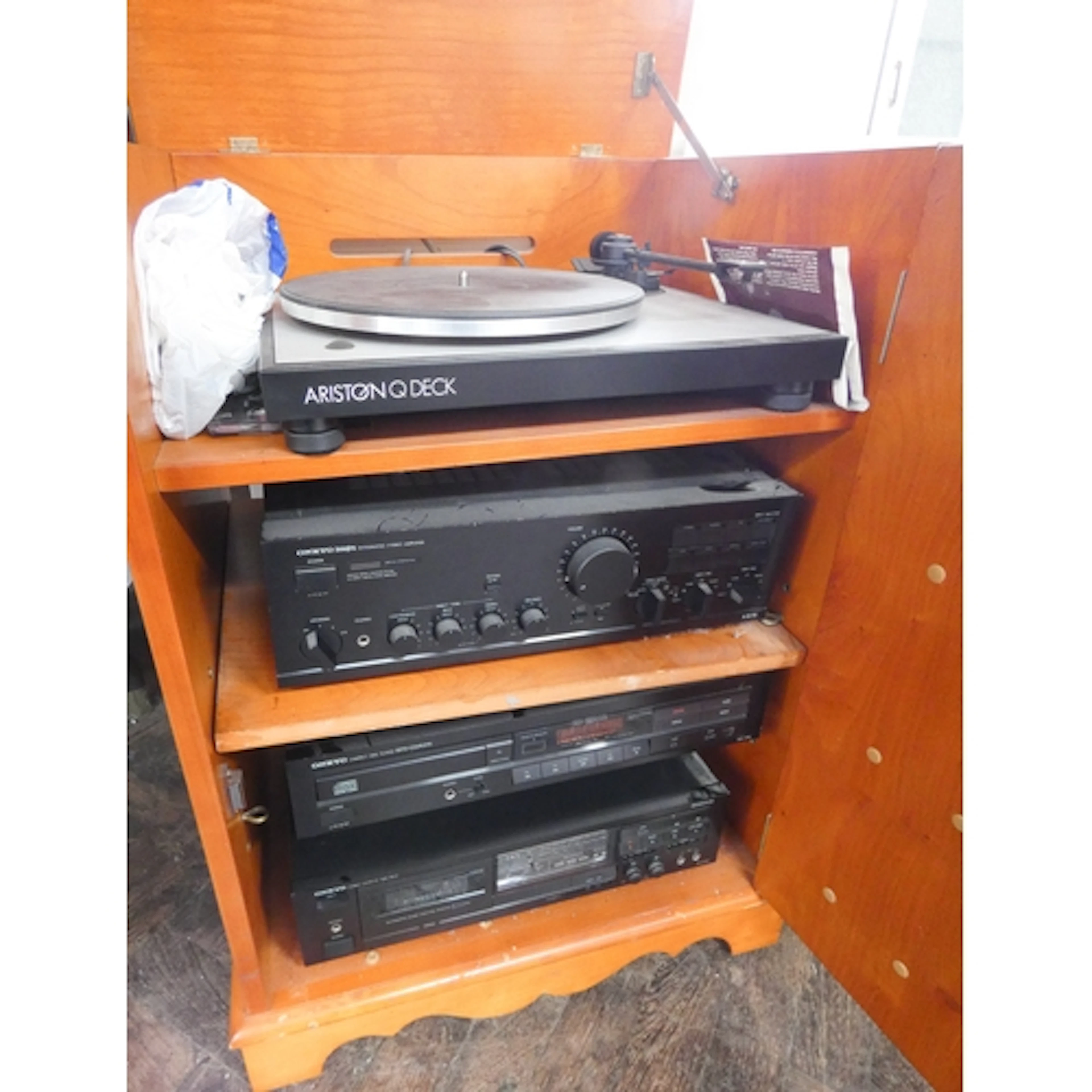A four tier music system including an Ariston deck, an Onkyo...