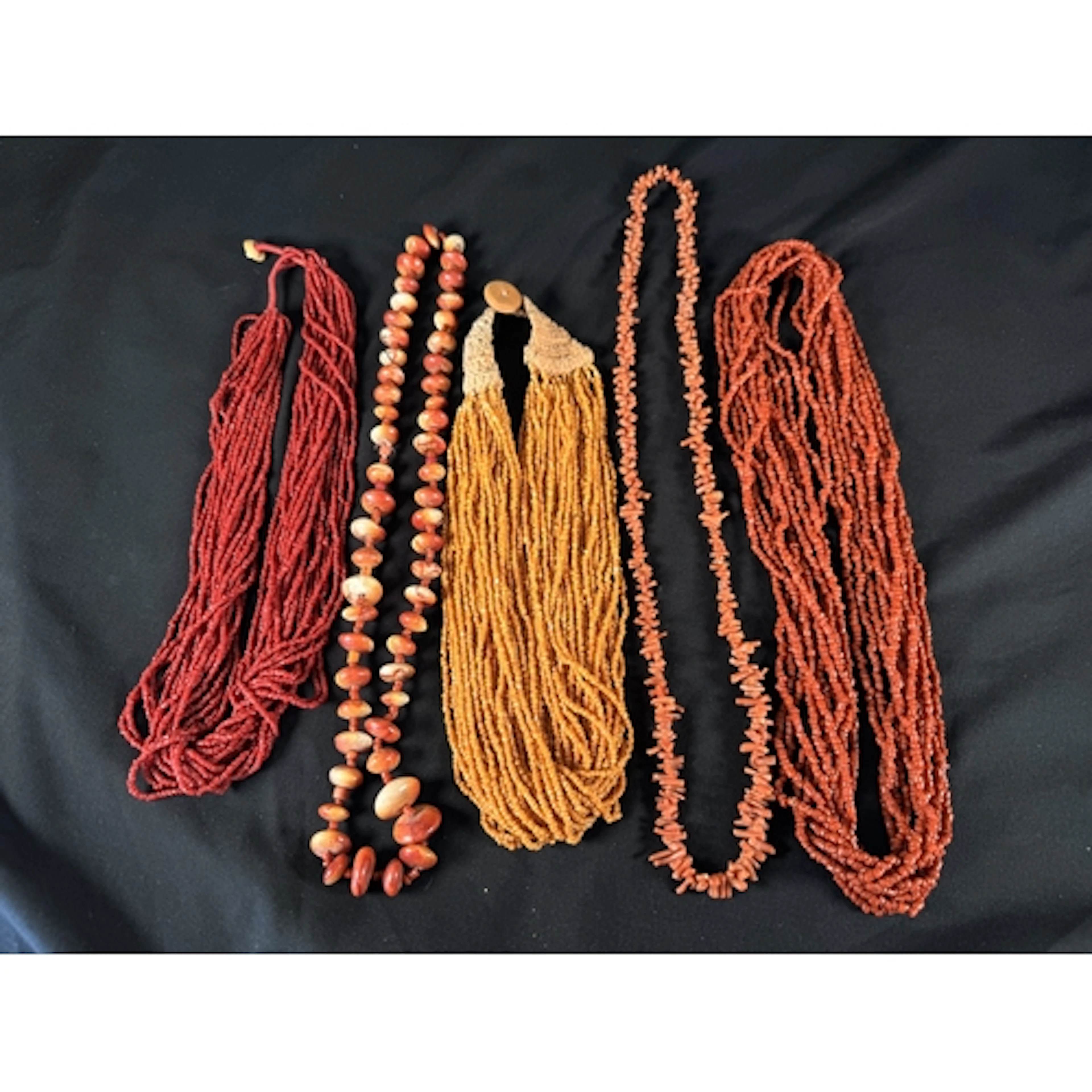 A selection of vintage coral bead necklaces