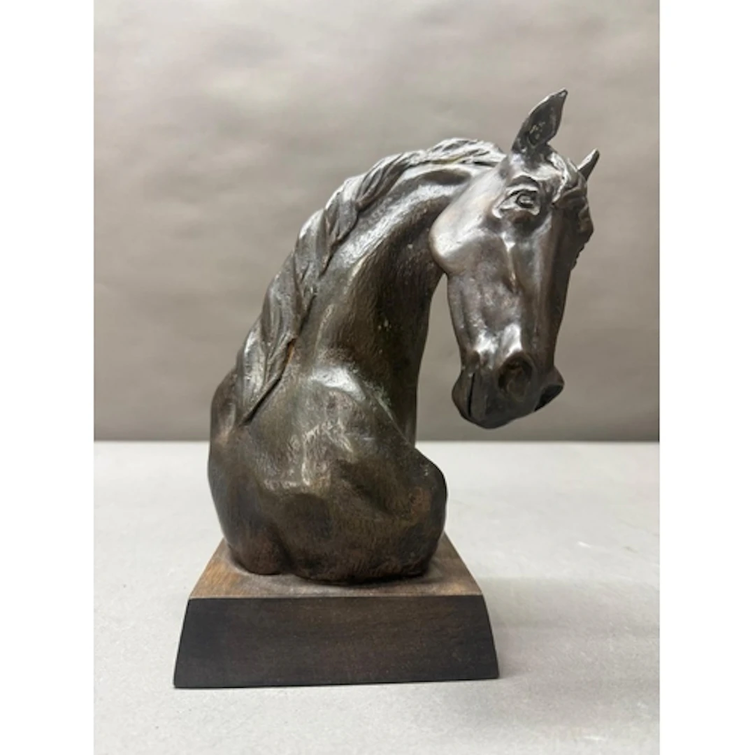 A bronze bust of a horse's head on a wooden plinth by Erica ...
