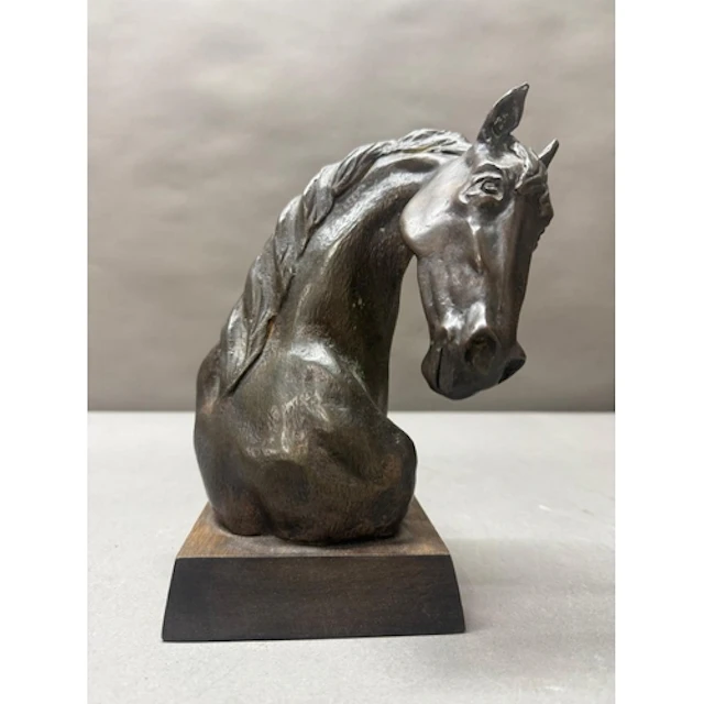 A bronze bust of a horse's head on a wooden plinth by Erica ...