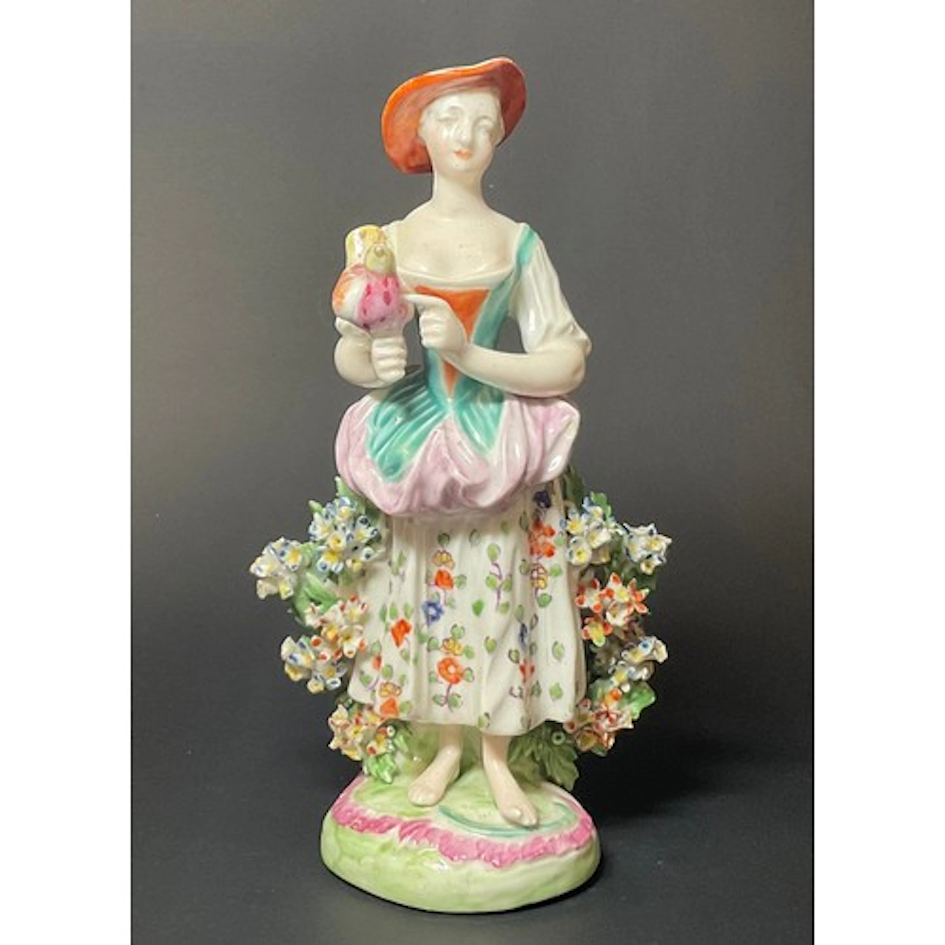 A Derby patch mark figure, Italian Farmer's Wife, she stands...