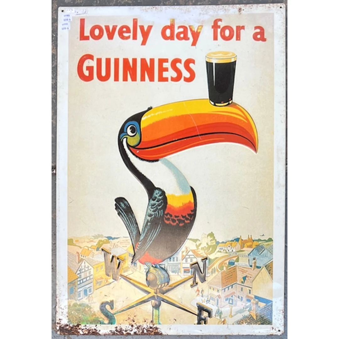 A reproduction Guinness advertising sign, 73x50cm