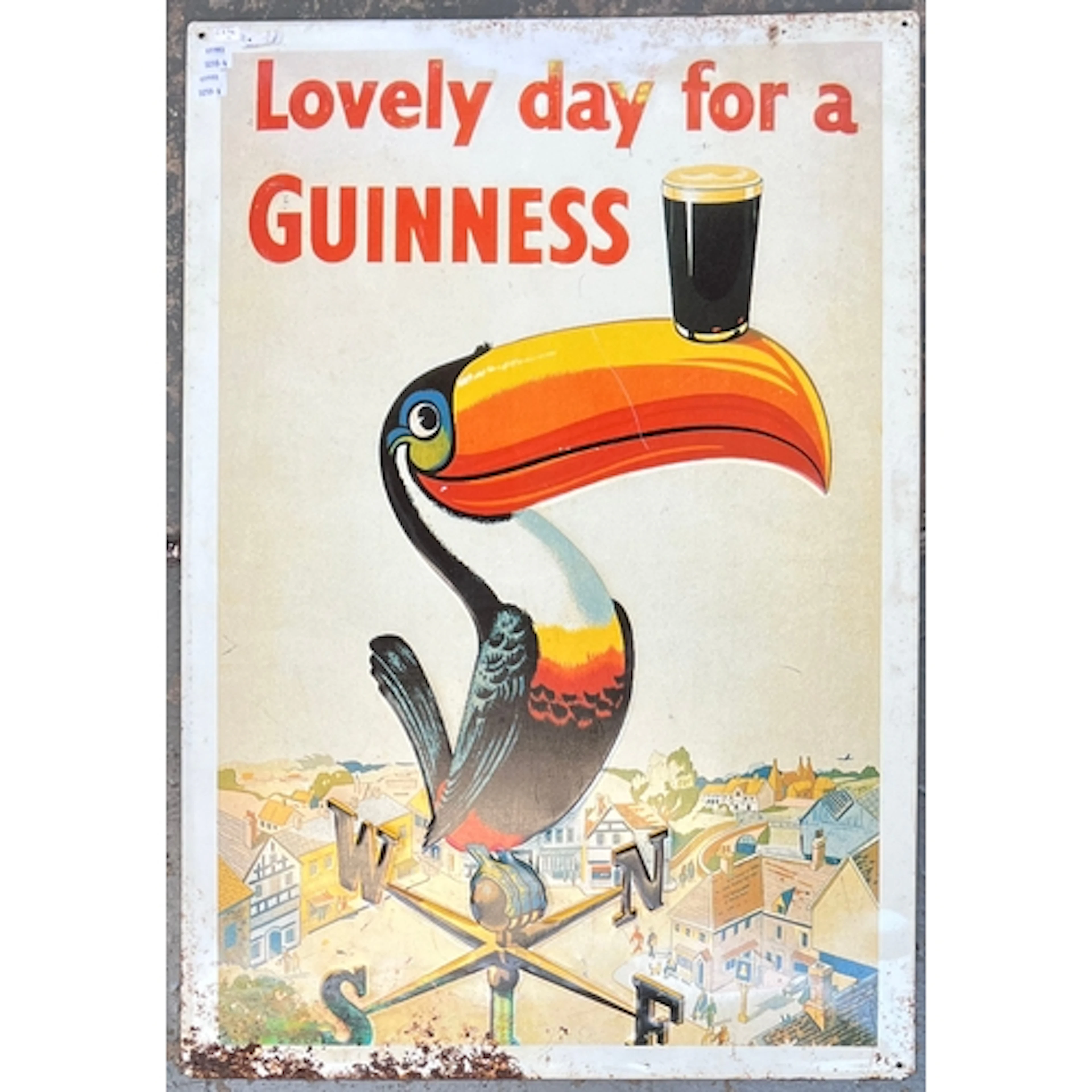 A reproduction Guinness advertising sign, 73x50cm
