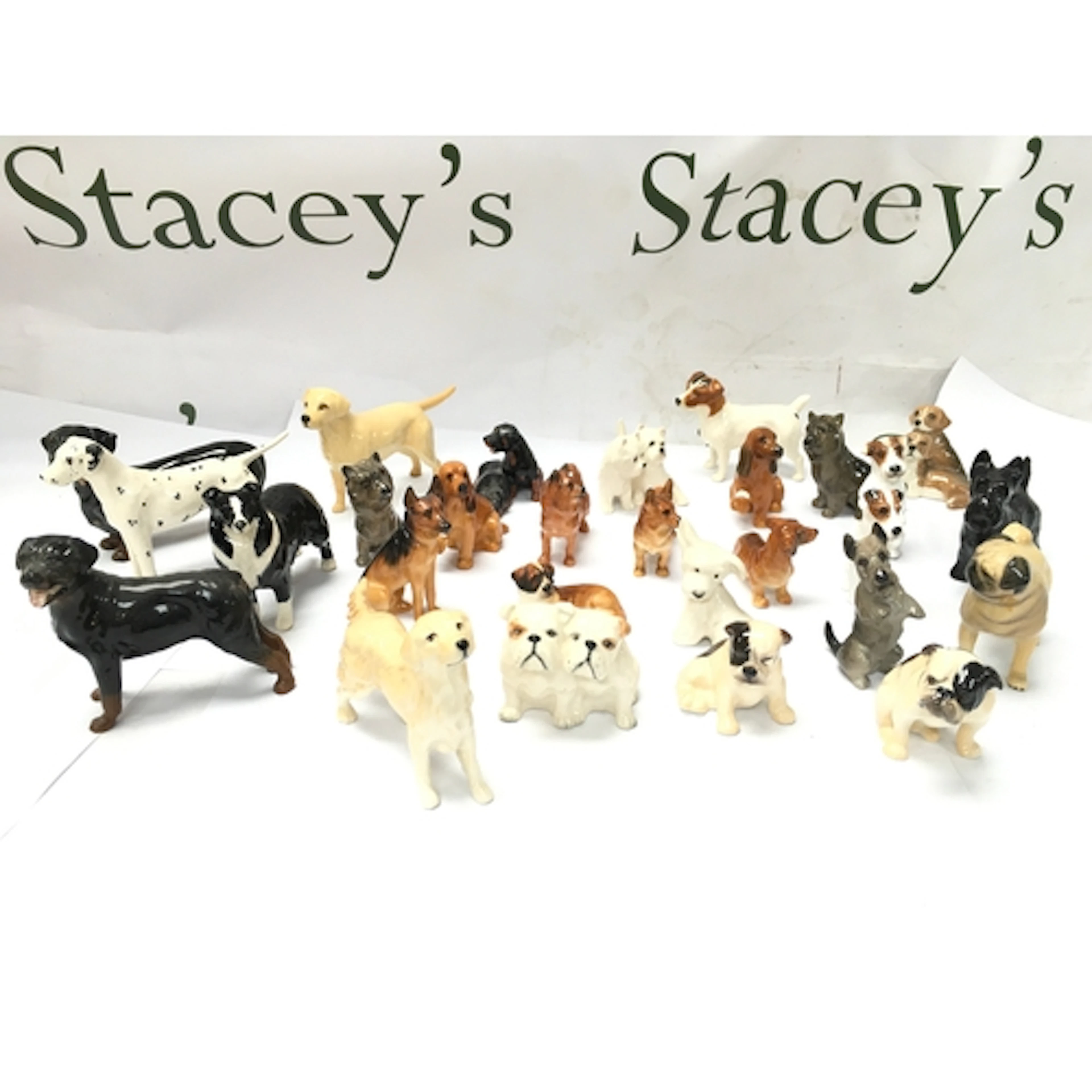 vintage ceramic and porcelain dog figurines, predominantly B...
