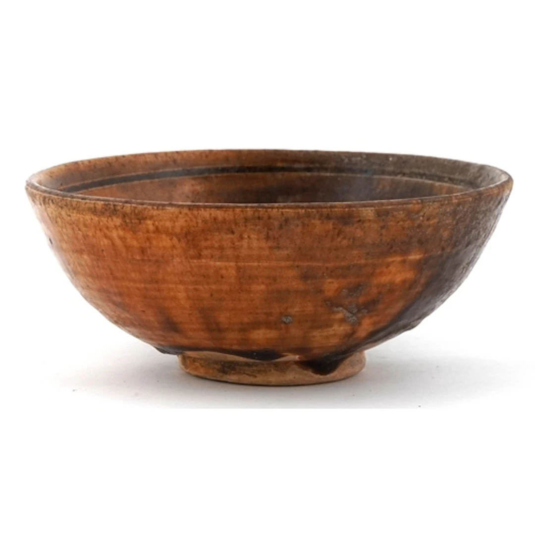 Antique Chinese stoneware footed bowl with brown treacle gla...