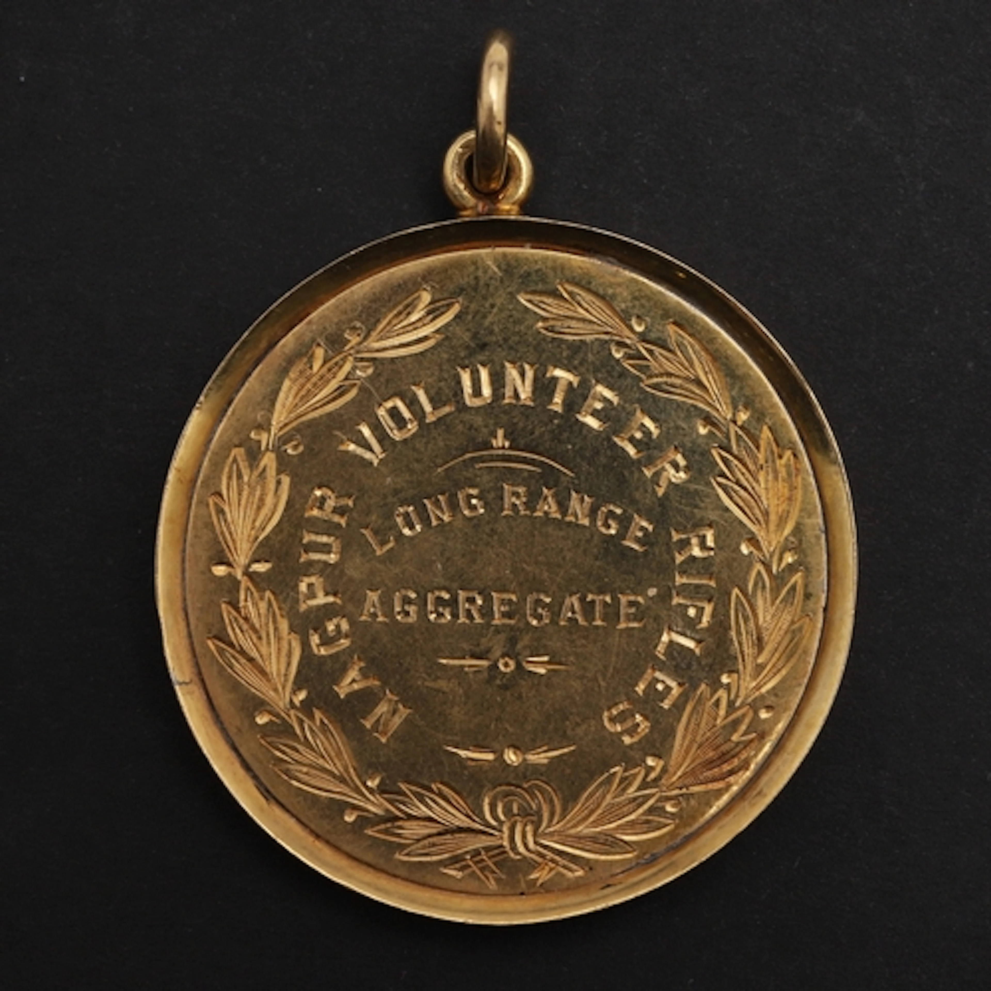 A VICTORIAN GOLD NAGPUR RIFLES SHOOTING MEDAL. A gold medal ...