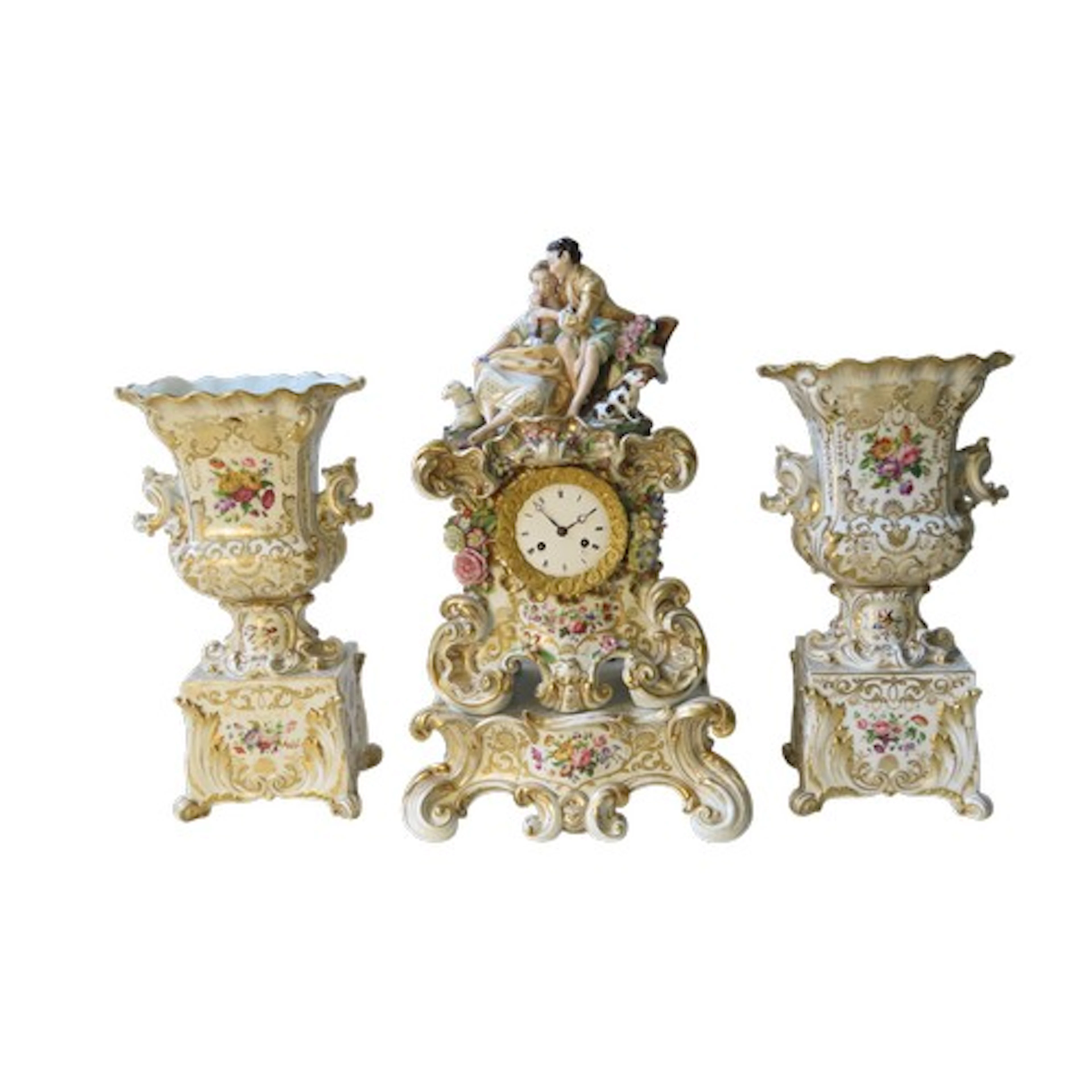 AN IMPRESSIVE CONTINENTAL CLOCK GARNITURE, the ornate clock ...
