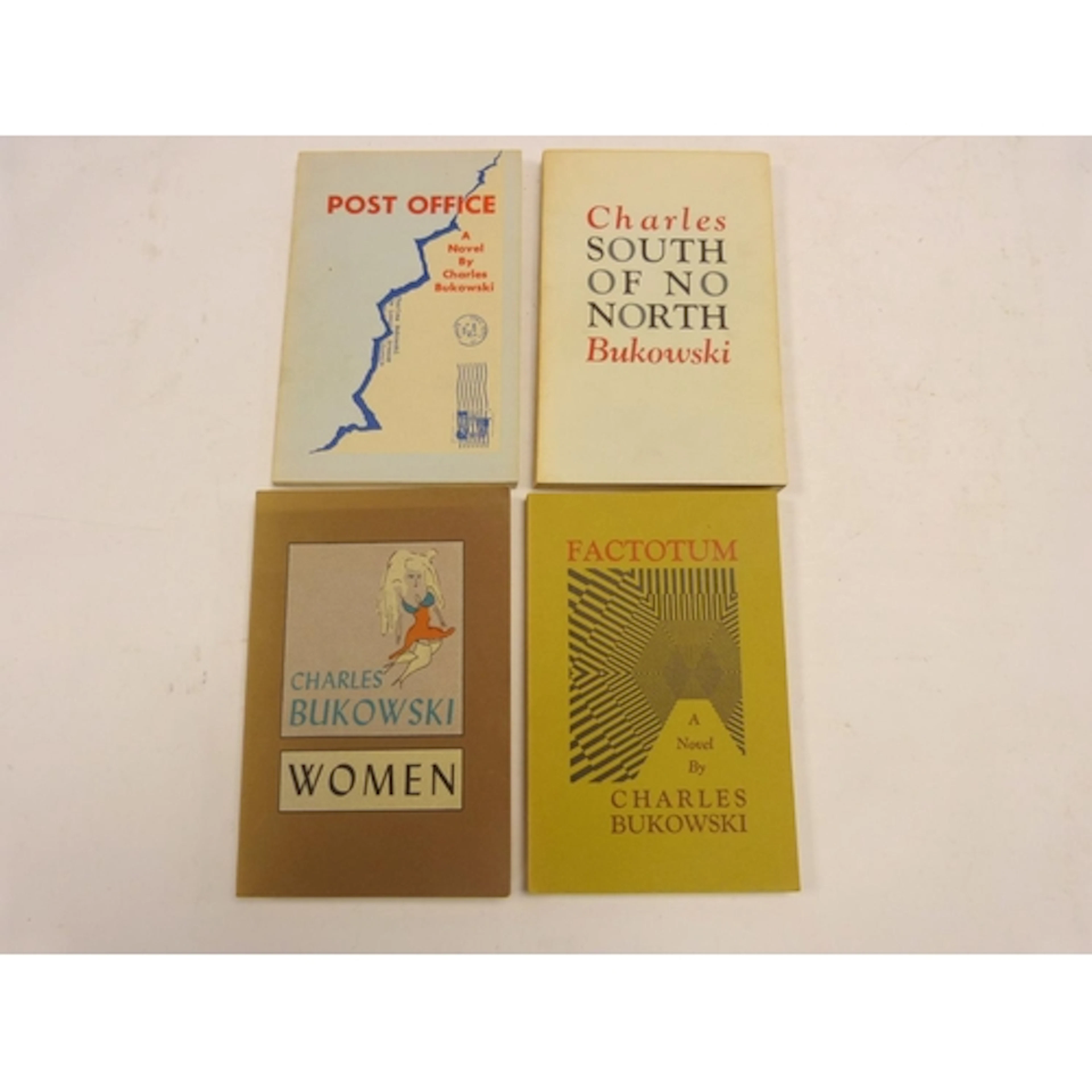 BUKOWSKI CHARLES. Four novels in orig. pict. card...