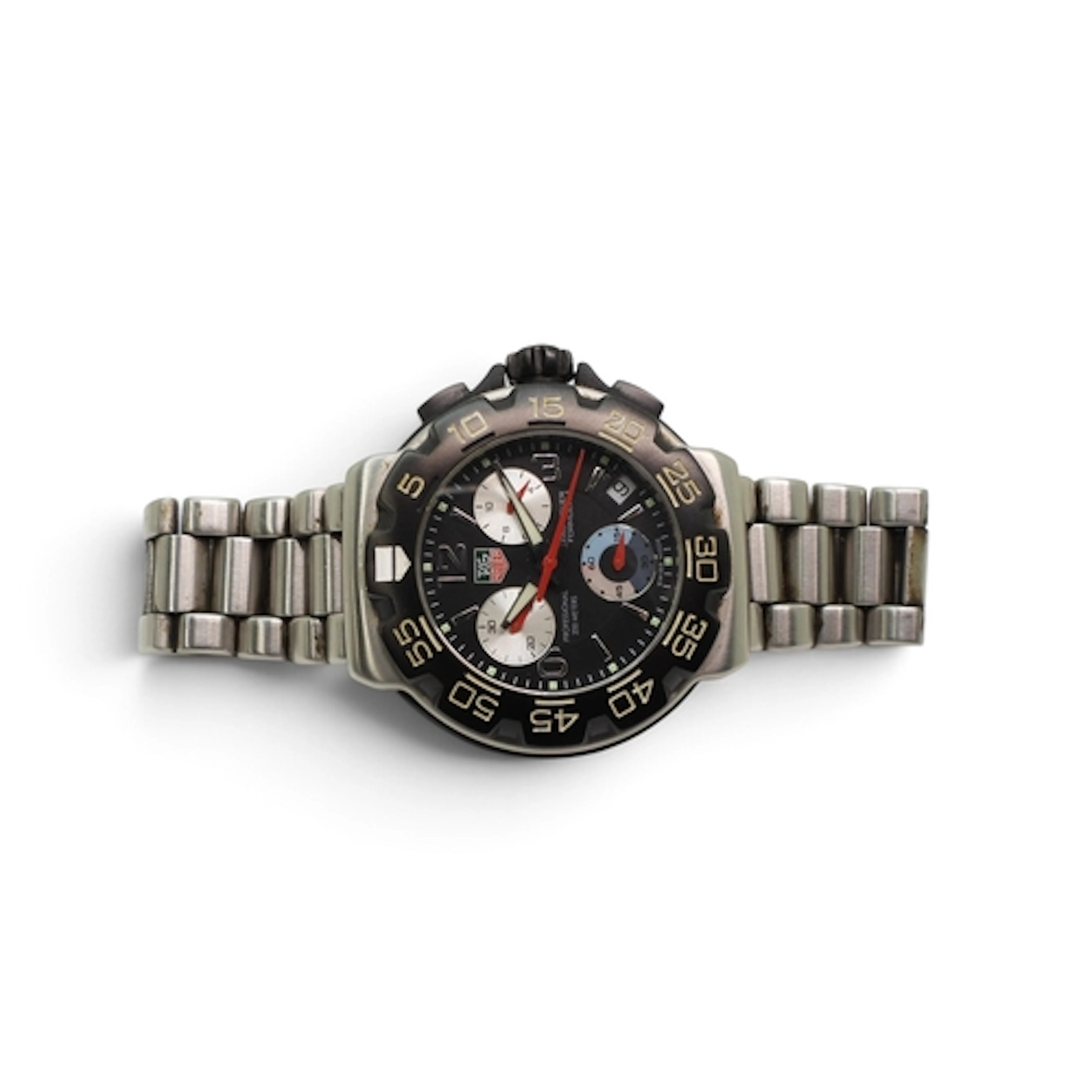 A TAG HEUER FORMULA 1 PROFESSIONAL 200M with black dial, red...
