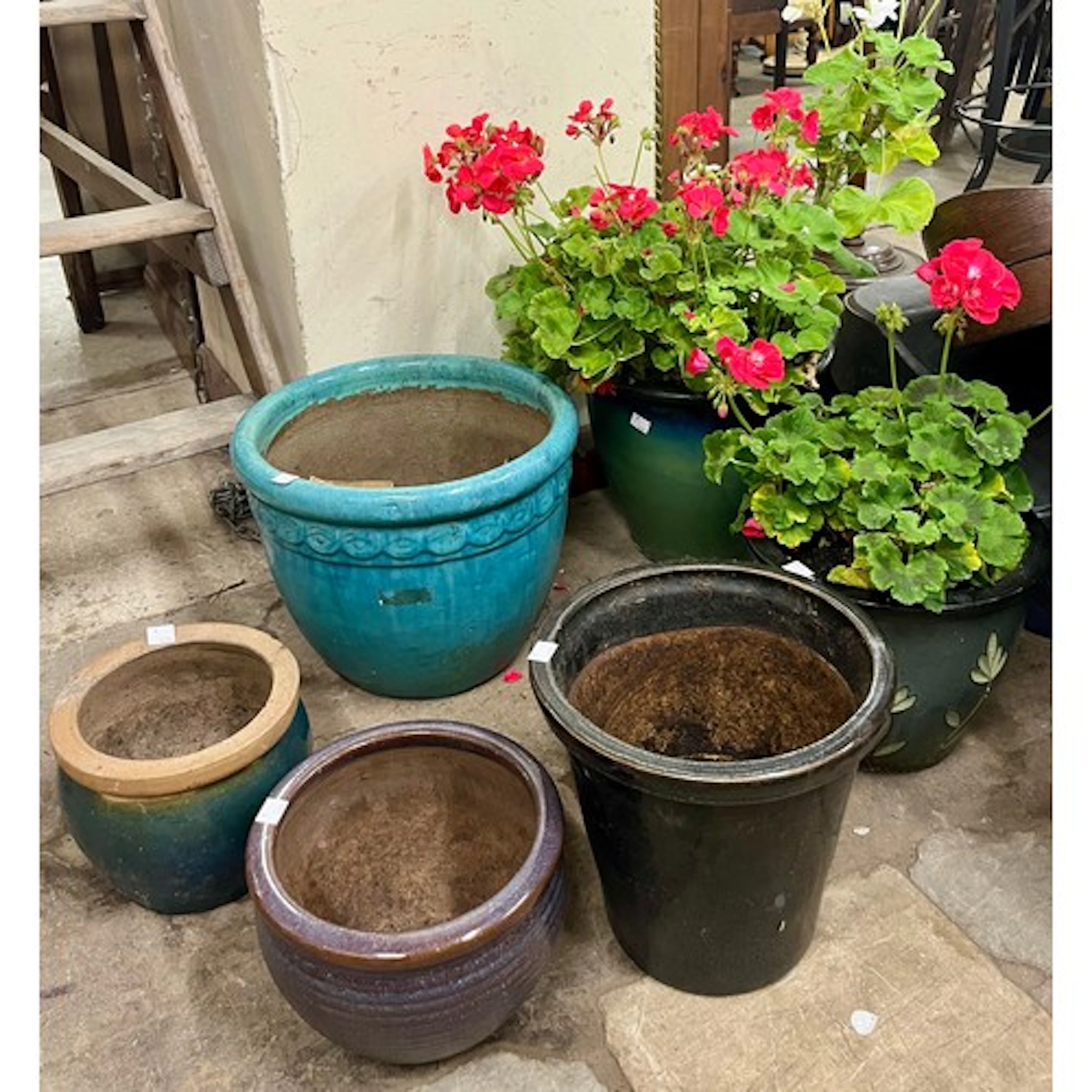 Six glazed terracotta garden planters