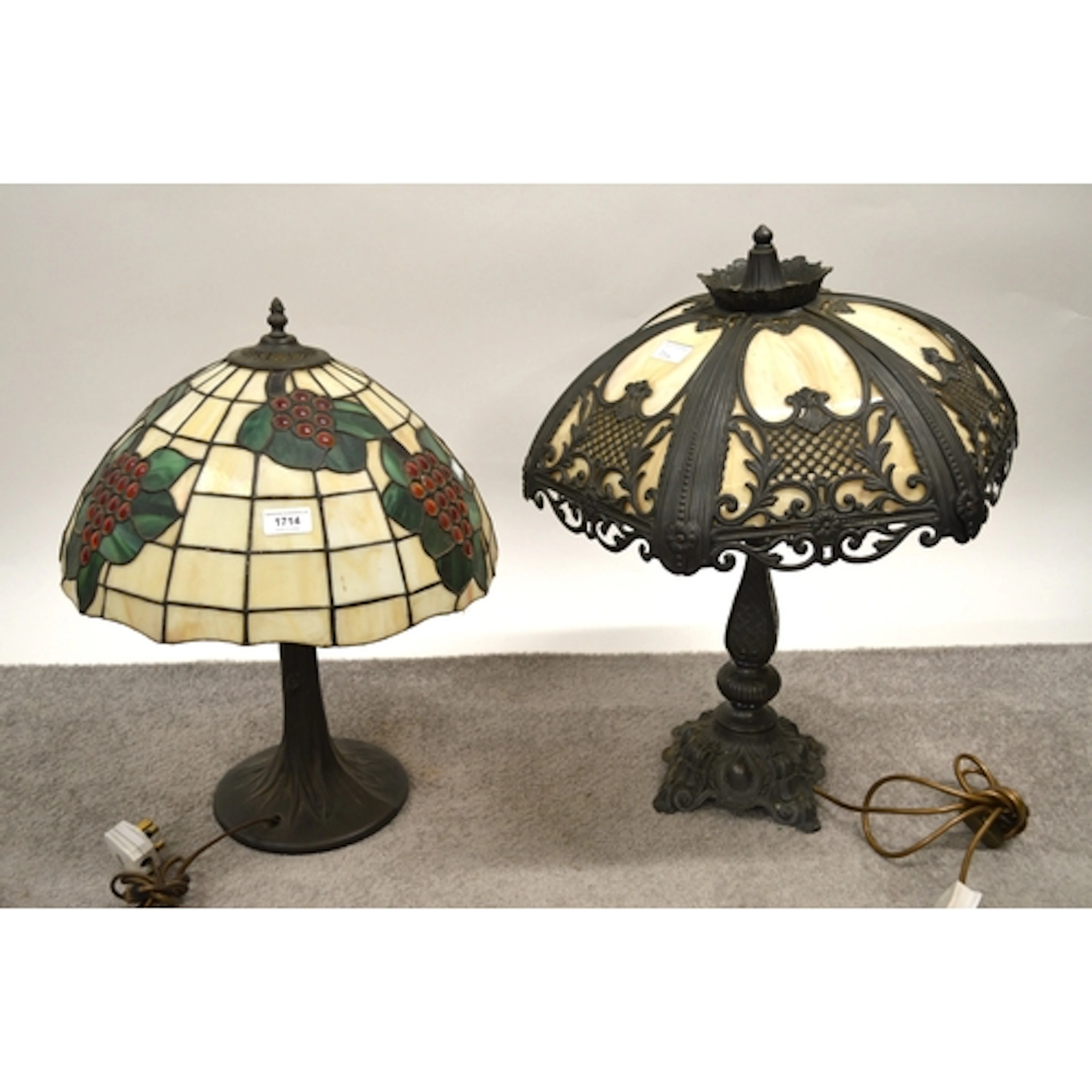 Tiffany style table lamp, with leaded glass shade, decorated...