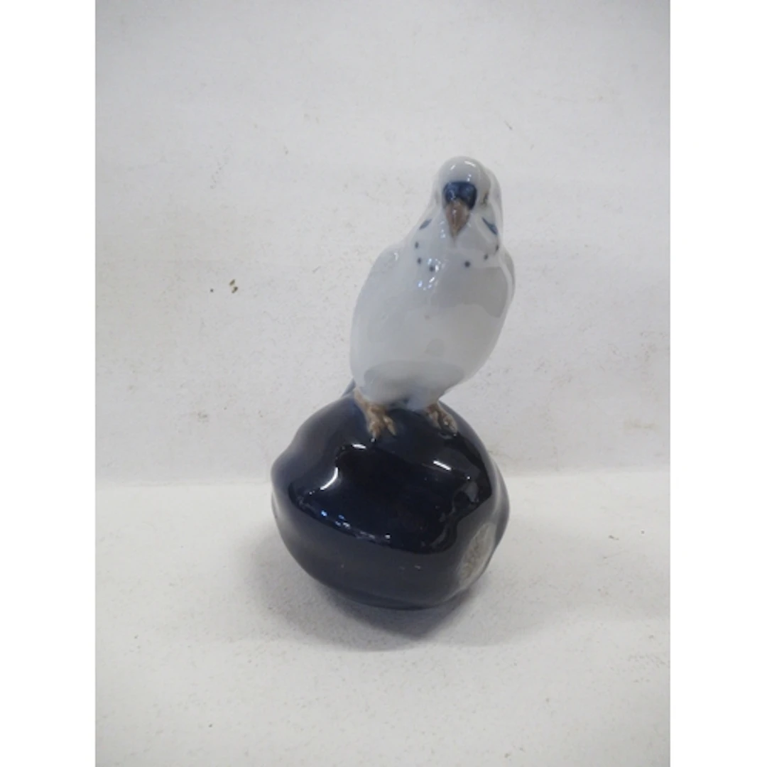 A Royal Copenhagen model, of a parakeet, model number V682