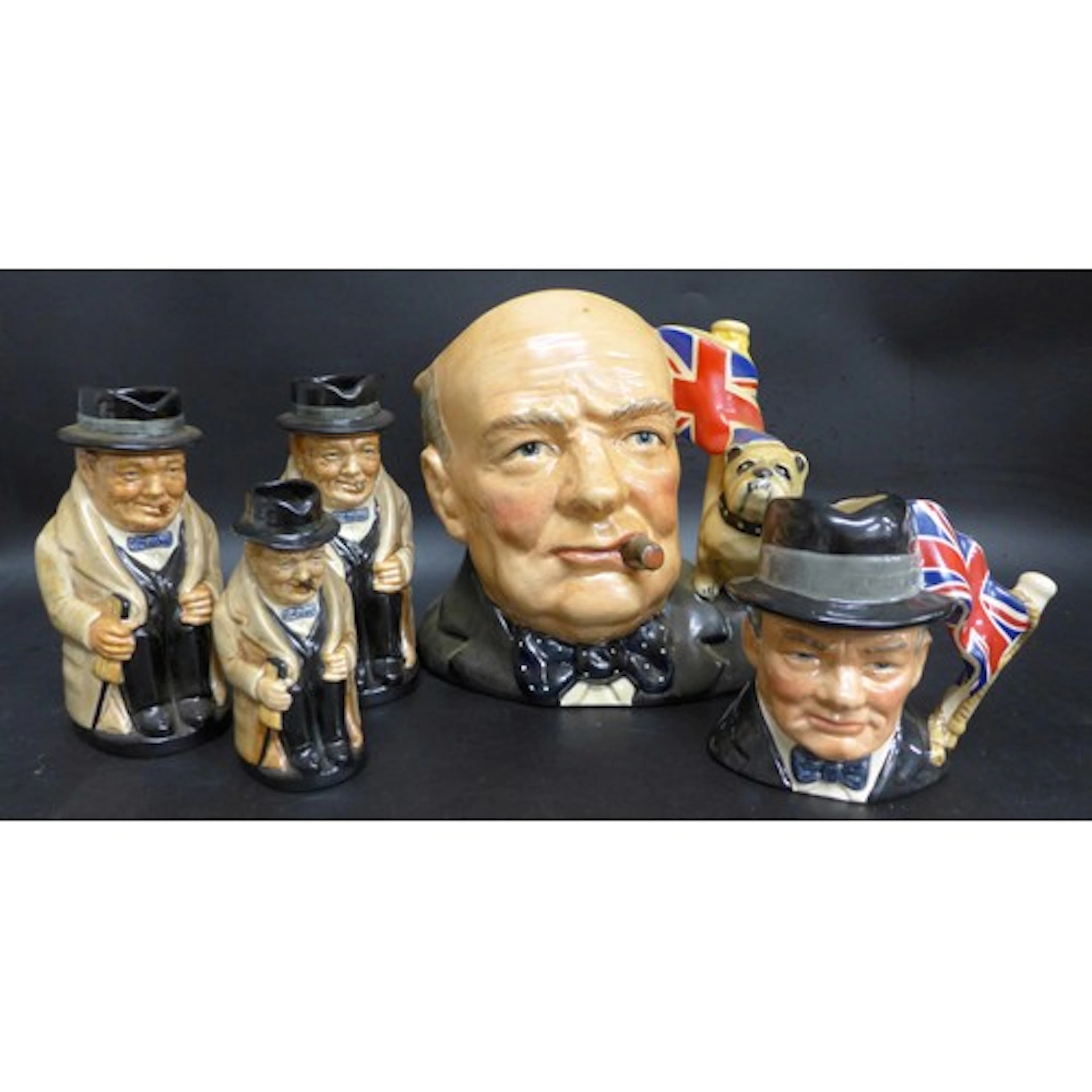 Five Winston Churchill Royal Doulton character jugs, all var...