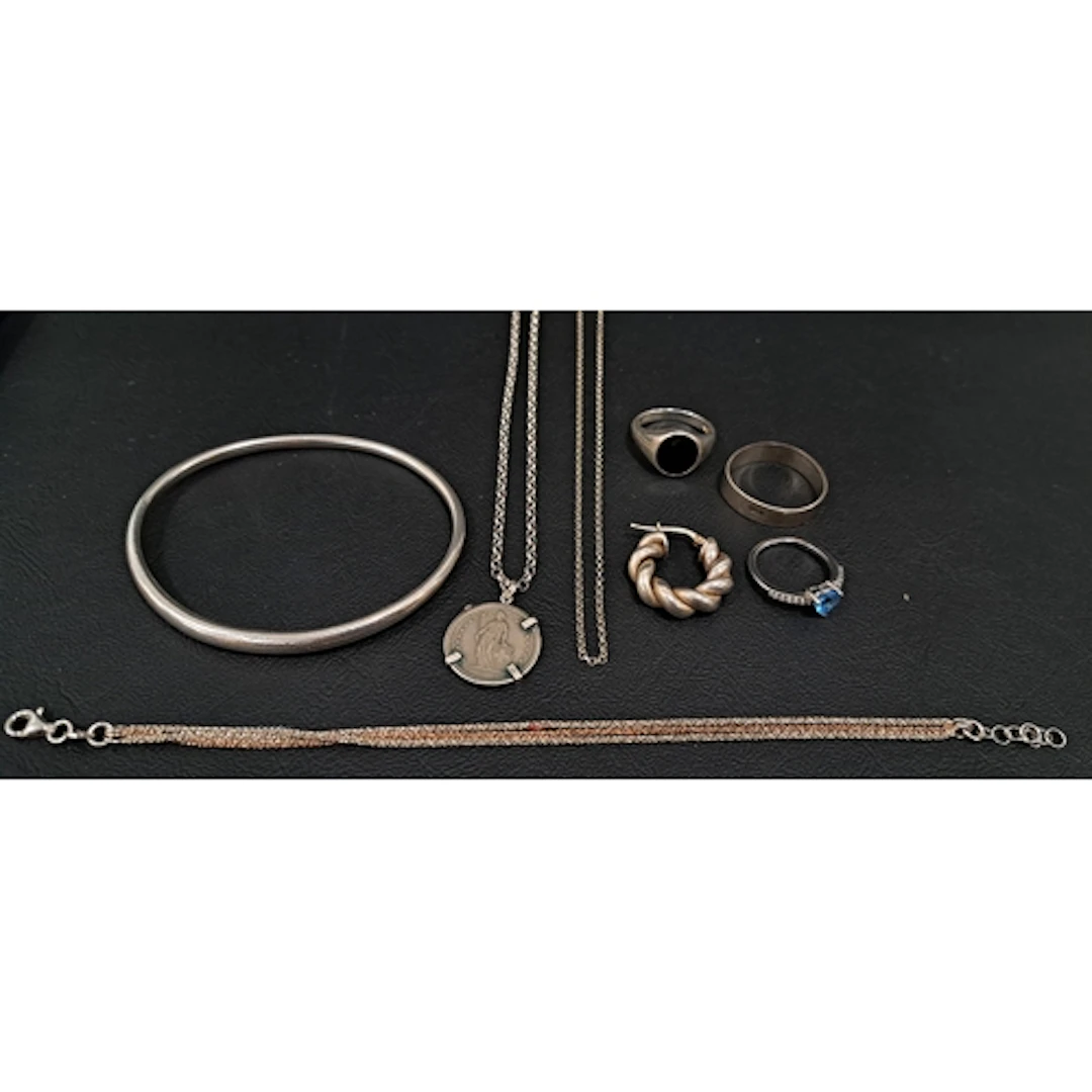 SELECTION OF SILVER JEWELLERY comprising a Pandora silver ba...