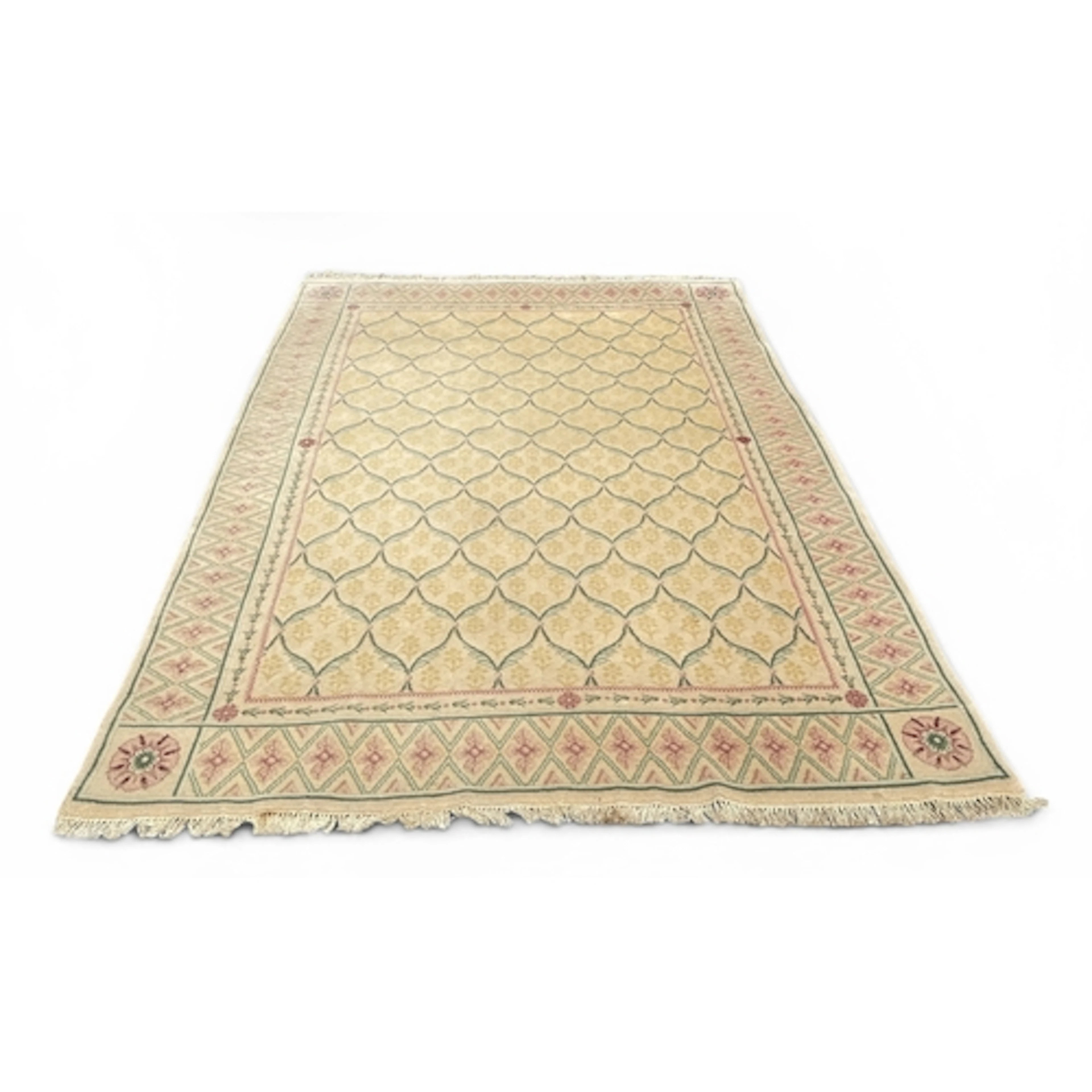 A FRENCH CARPET WITH IVORY FIELDS 268 x 187 cm