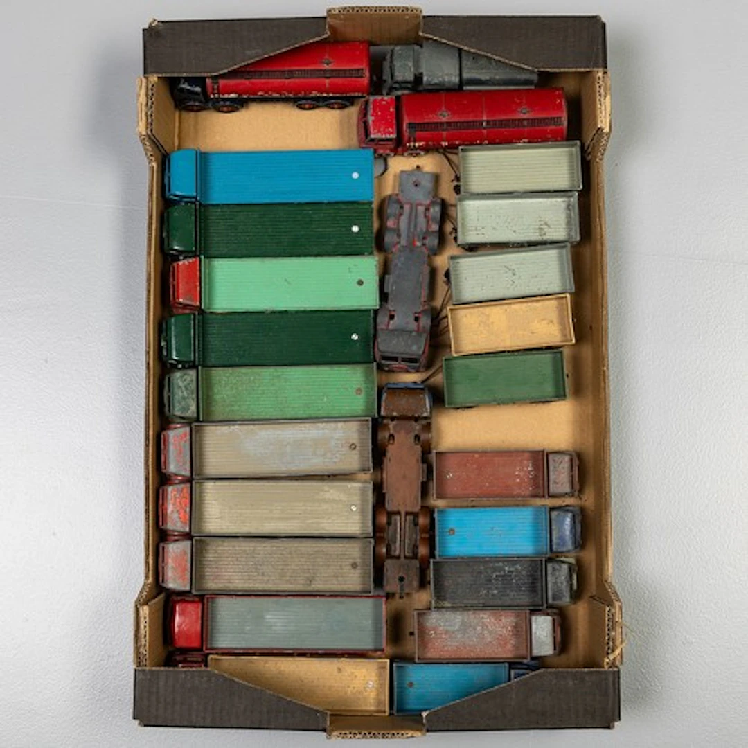 Fruit tray containing unboxed playworn Dinky commercial vehi...