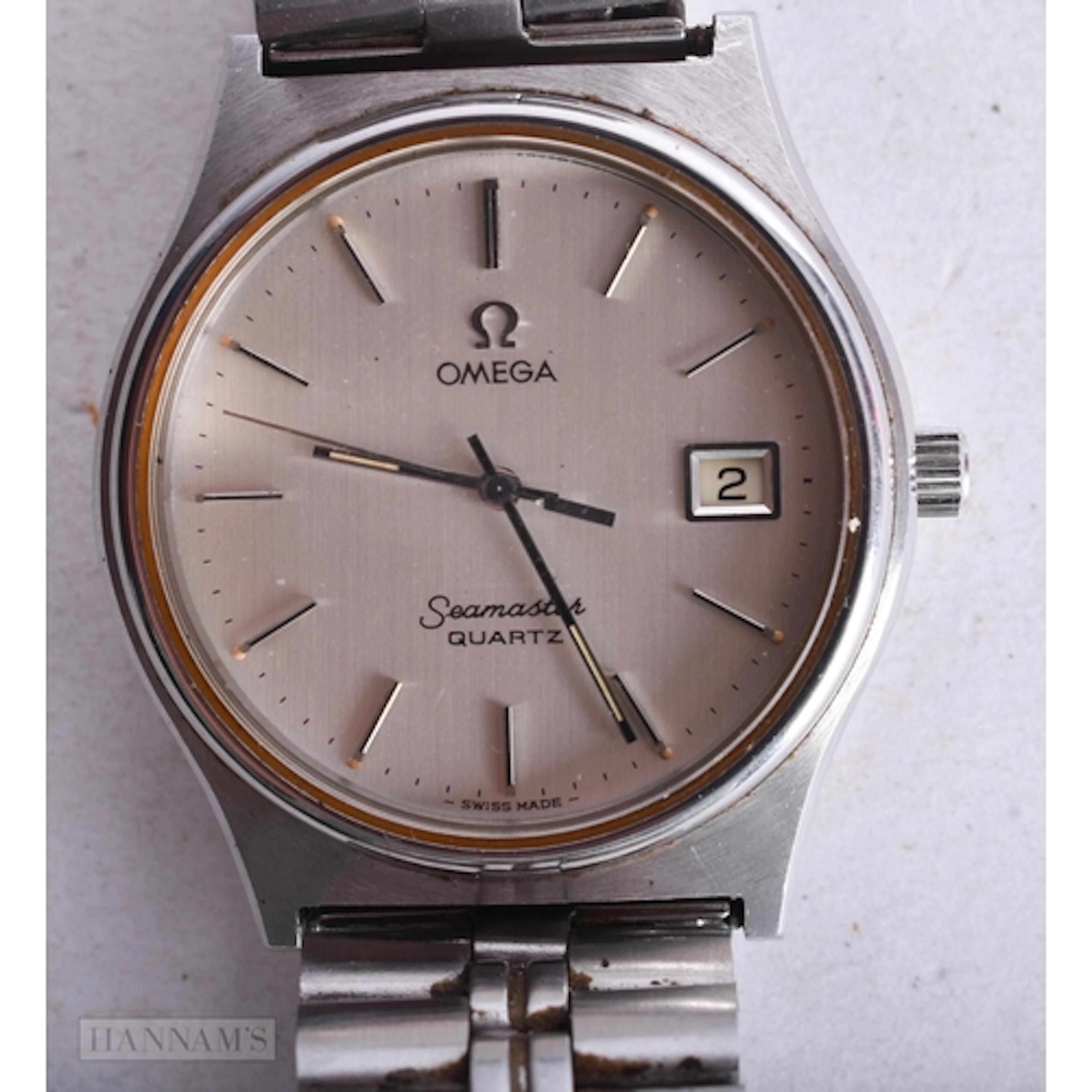 AN OMEGA SEAMASTER WRIST WATCH. Not running. 3 cm wide.
