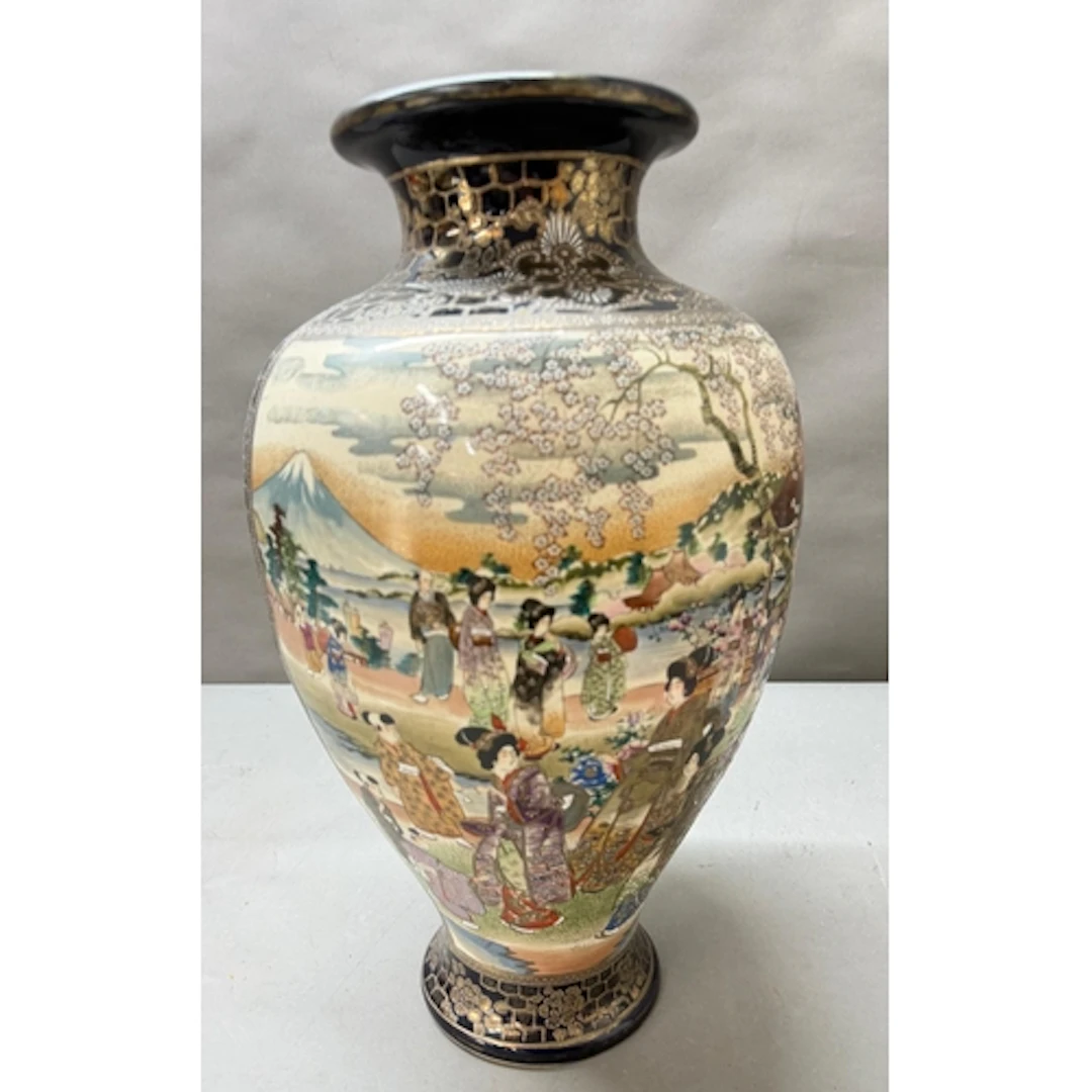A Japanese satsuma vase, decorated to side with traditional ...