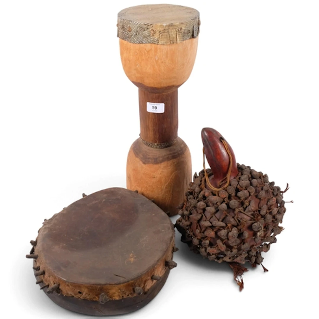 An African gourd rattle, Cameroon, H27cm, and 2 African carv...