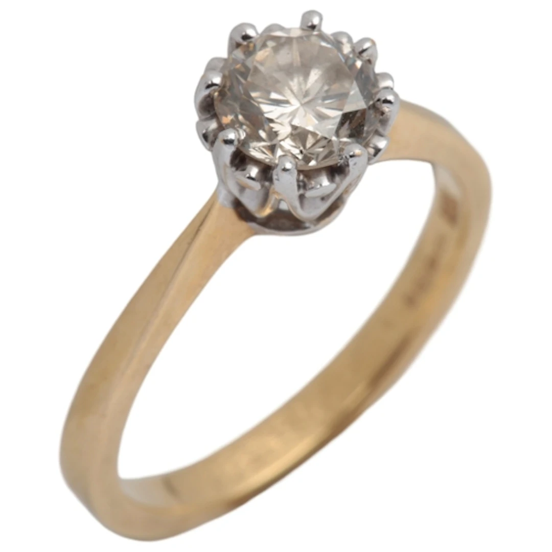 A diamond ring, claw-set with a brilliant-cut diamond weighi...