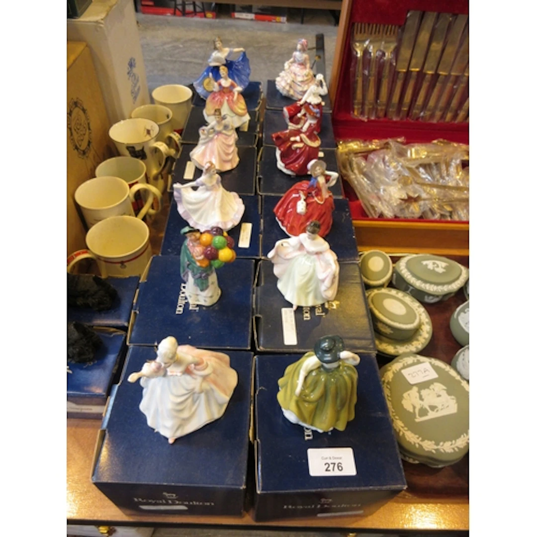 Twelve Royal Doulton Figures