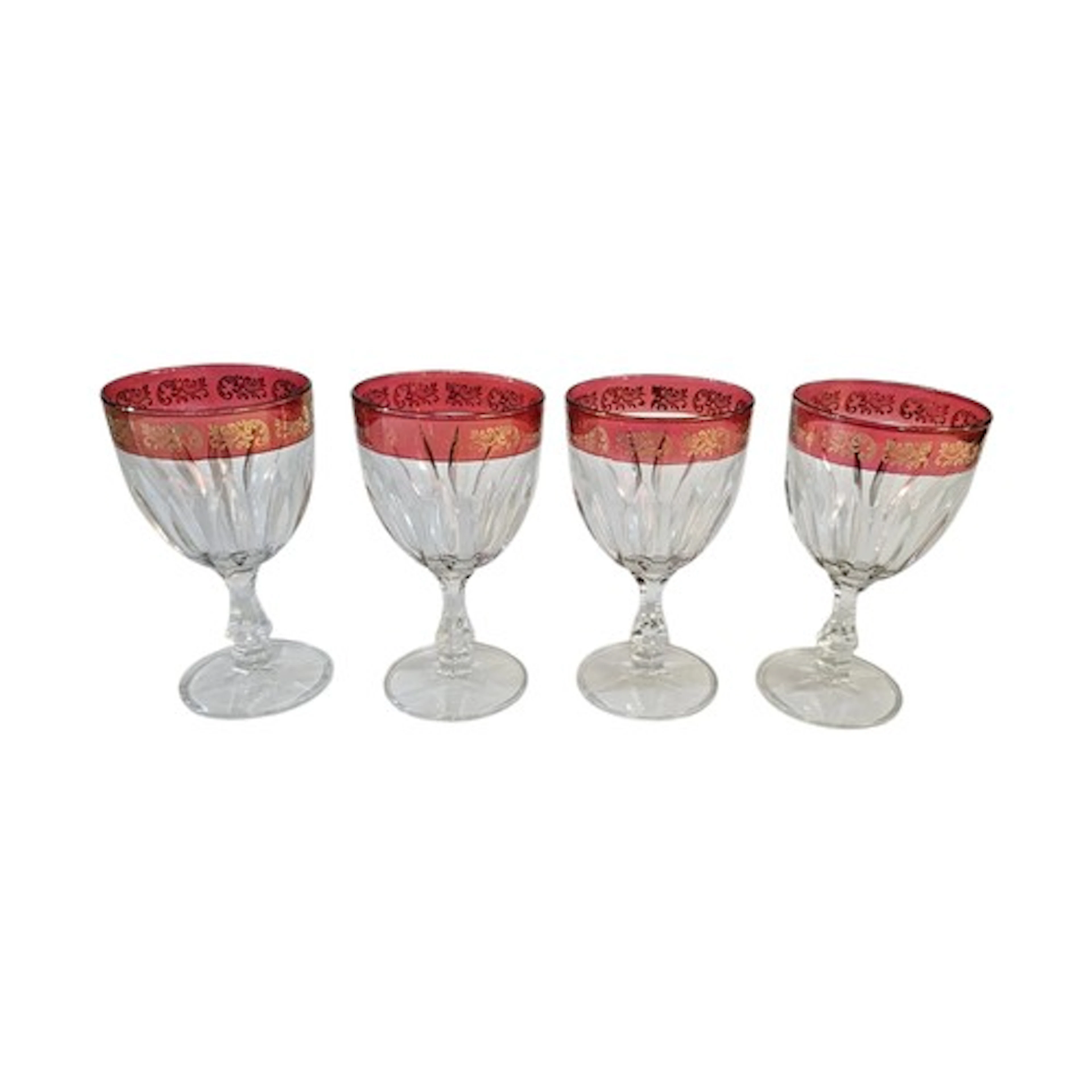 A SET OF FOUR MID CENTURY ITALIAN RUBY AND CLEAR GLASS GOBLE...