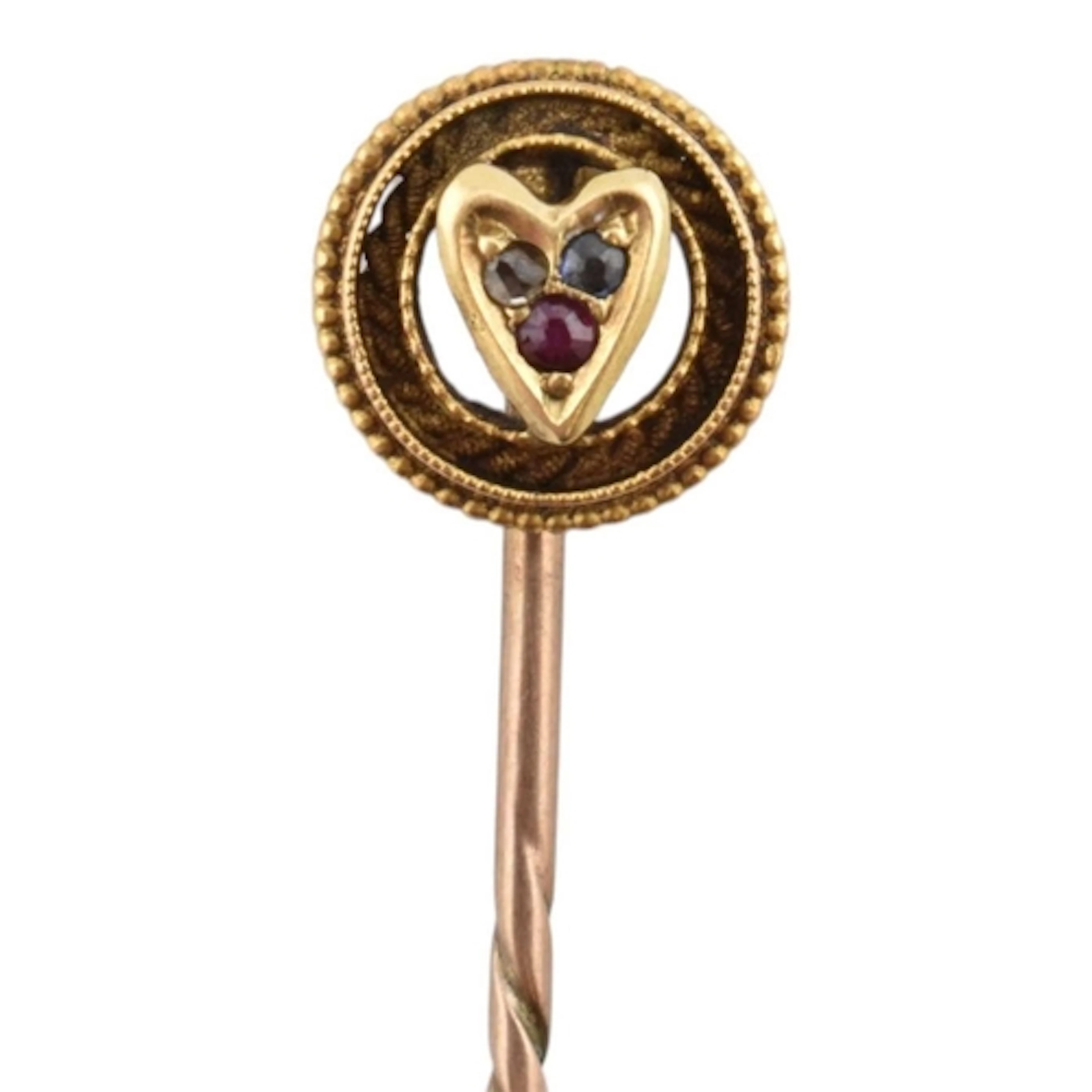 An early 20th century ruby, sapphire and diamond lapel stick...