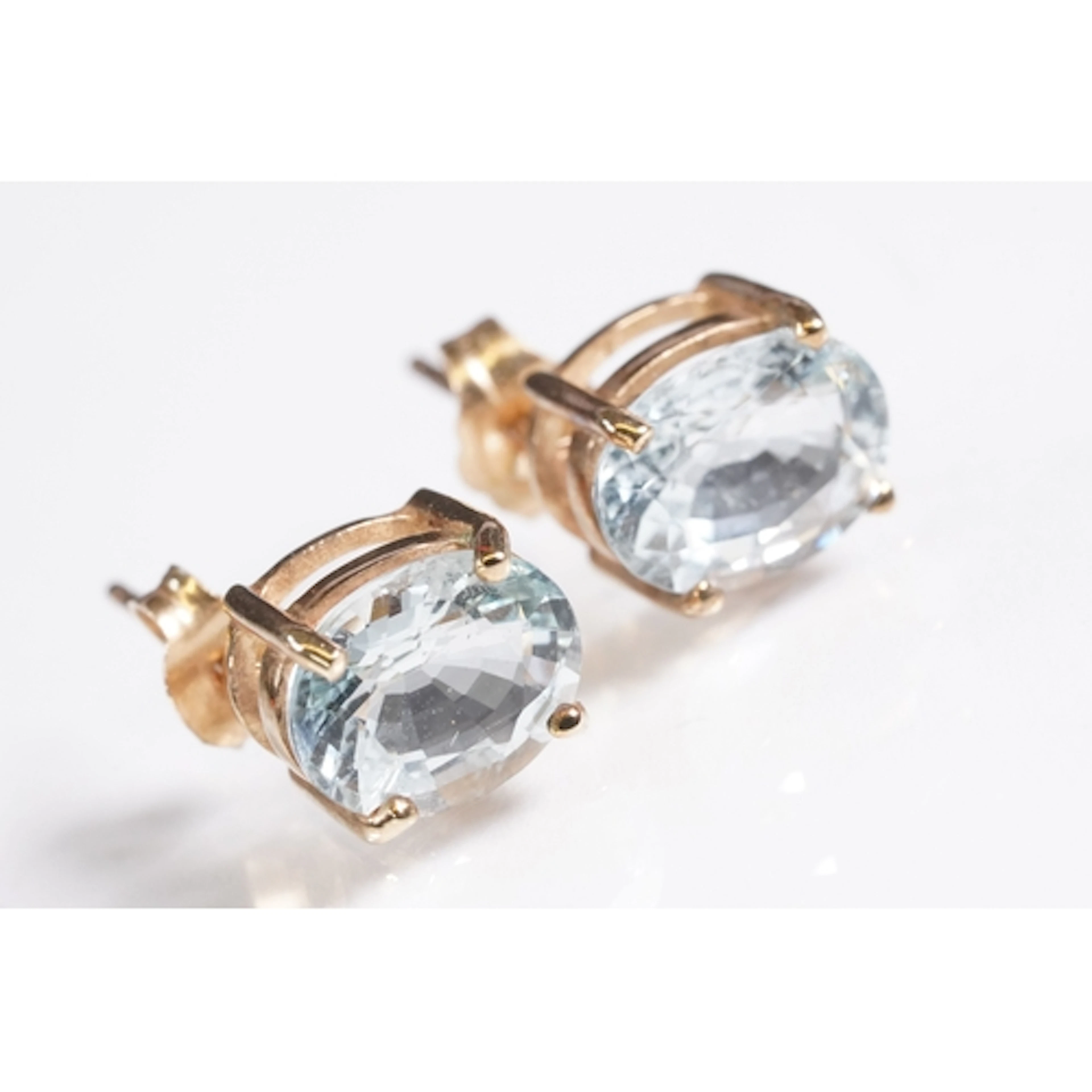 Pair of 9ct gold and aquamarine stud earrings. Hallmarked Bi...