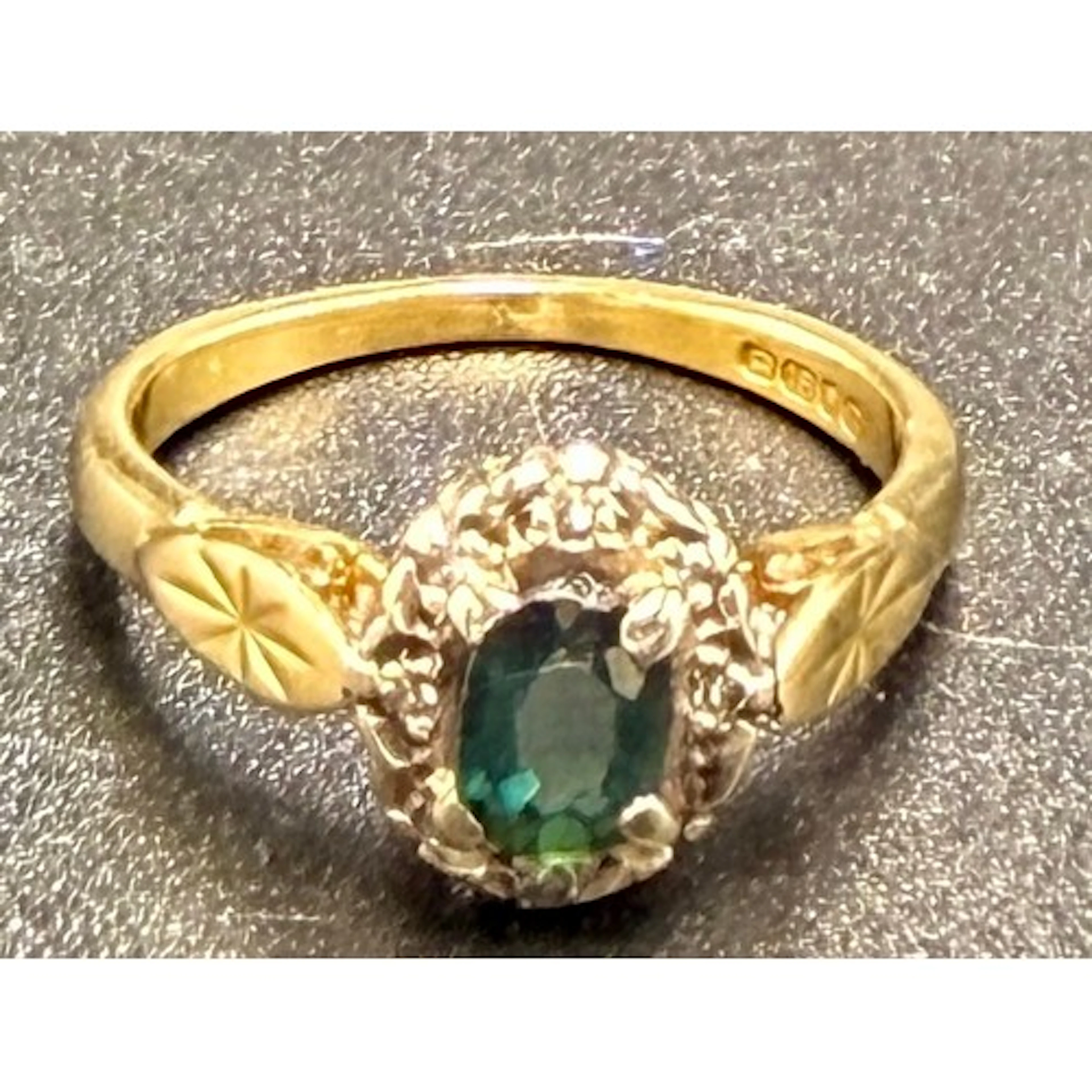 An 18 carat gold sapphire and diamond cluster ring. Size J. ...