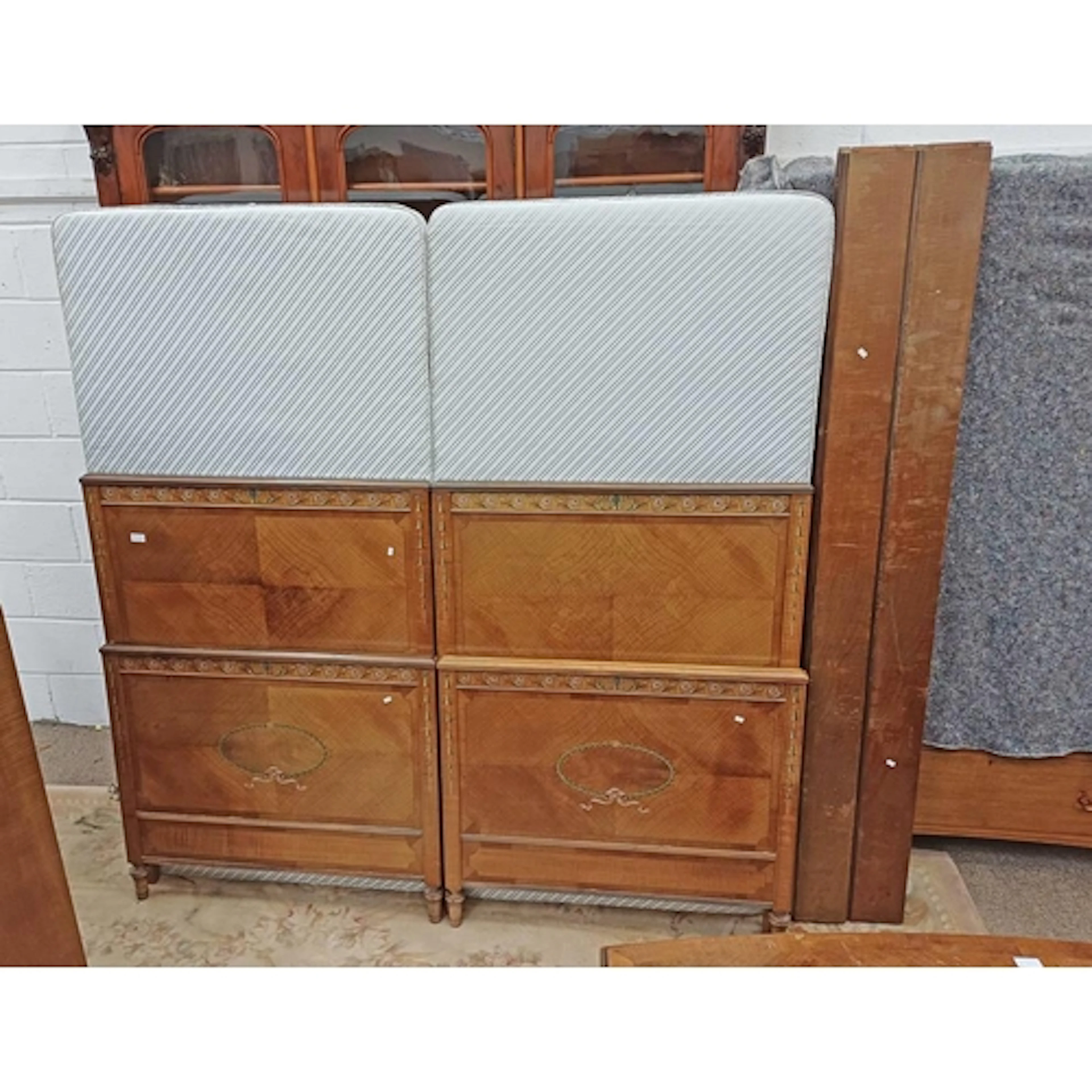 PAIR OF REGENCY STYLE SATIN SINGLE BED FRAMES WITH PAINTED D...