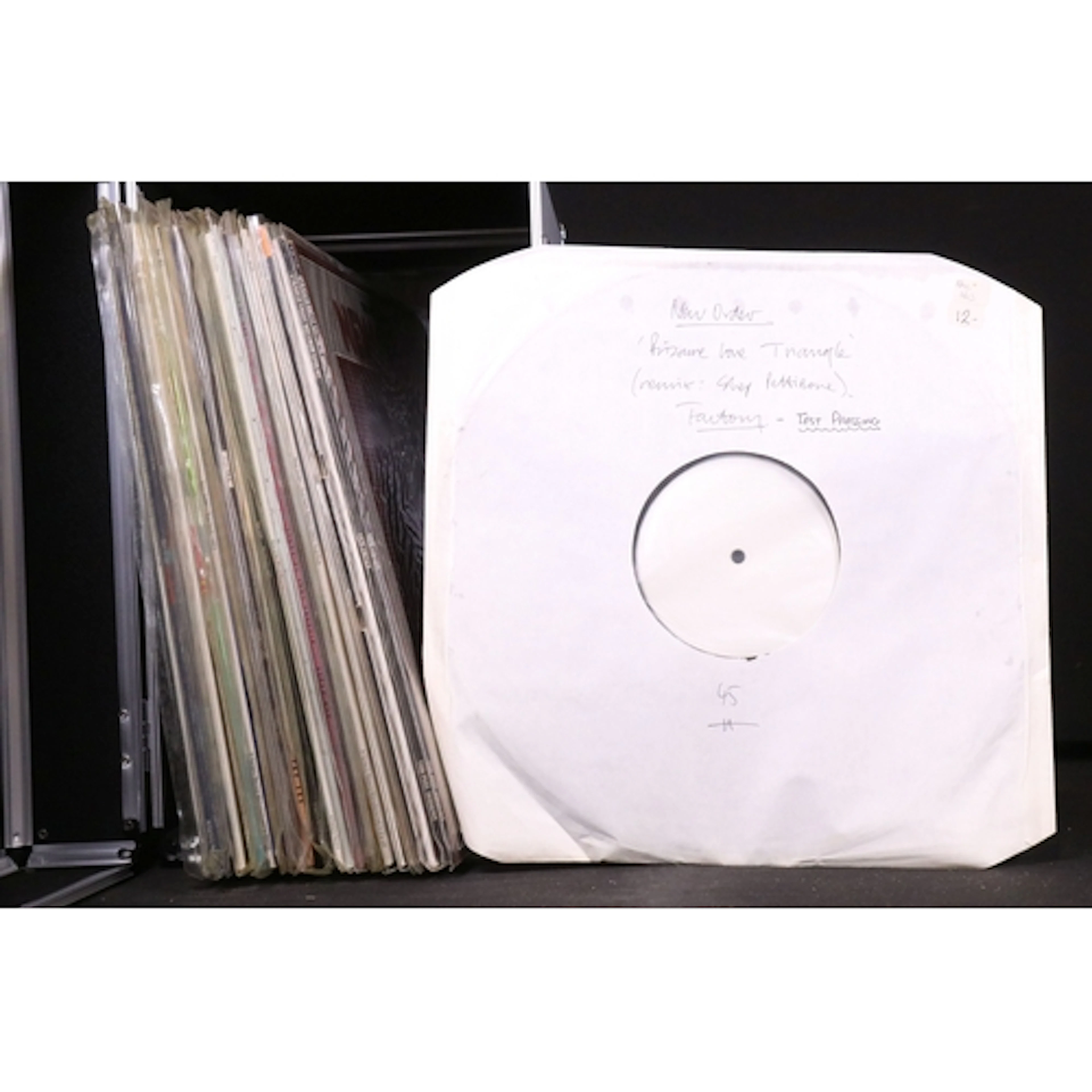 Vinyl - 25 UK pressing New Order 12" singles spanning their ...