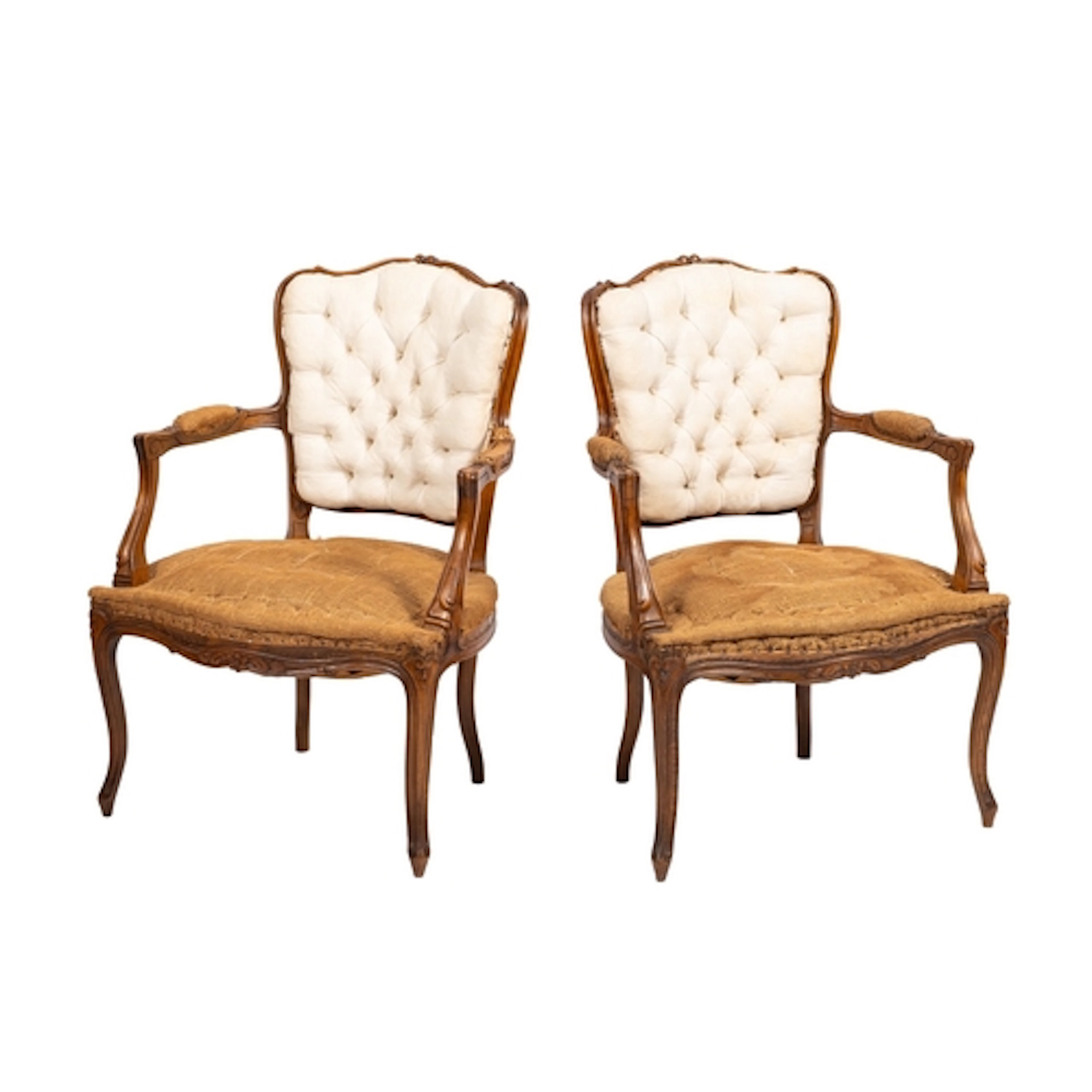 A pair of carved walnut elbow chairs in 18th century style, ...