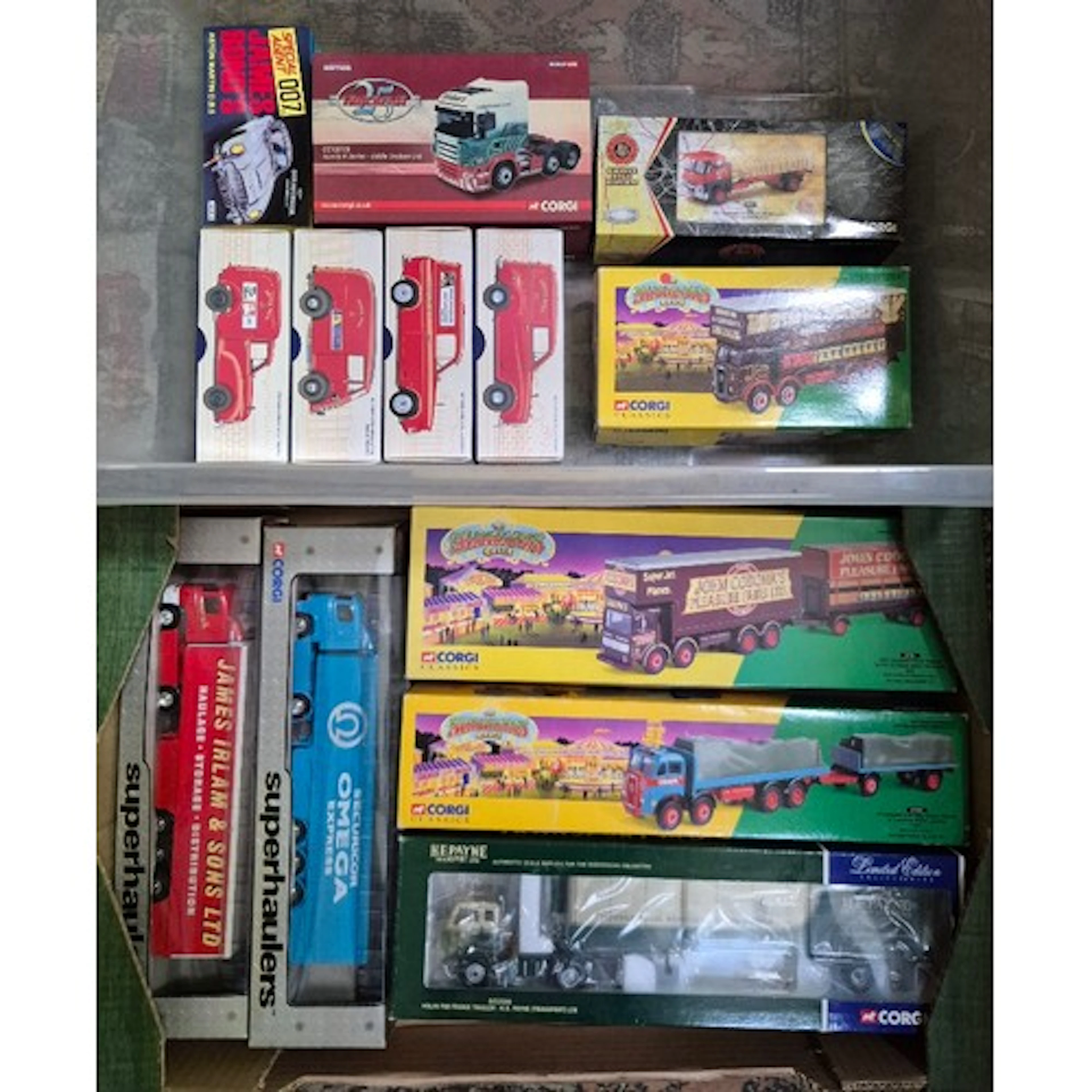 Two boxes of assorted Corgi diecast model vehicles, all in b...